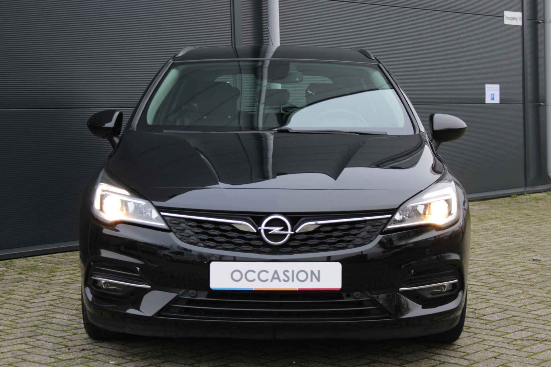 Opel Astra Sports Tourer 1.2 Turbo 130pk Business Edition / Trekhaak / Camera / Park Pilot V+A / Navigatie / Carplay / Climate Control / "Vraag een vrijblijvende offerte aan!" - 13/28