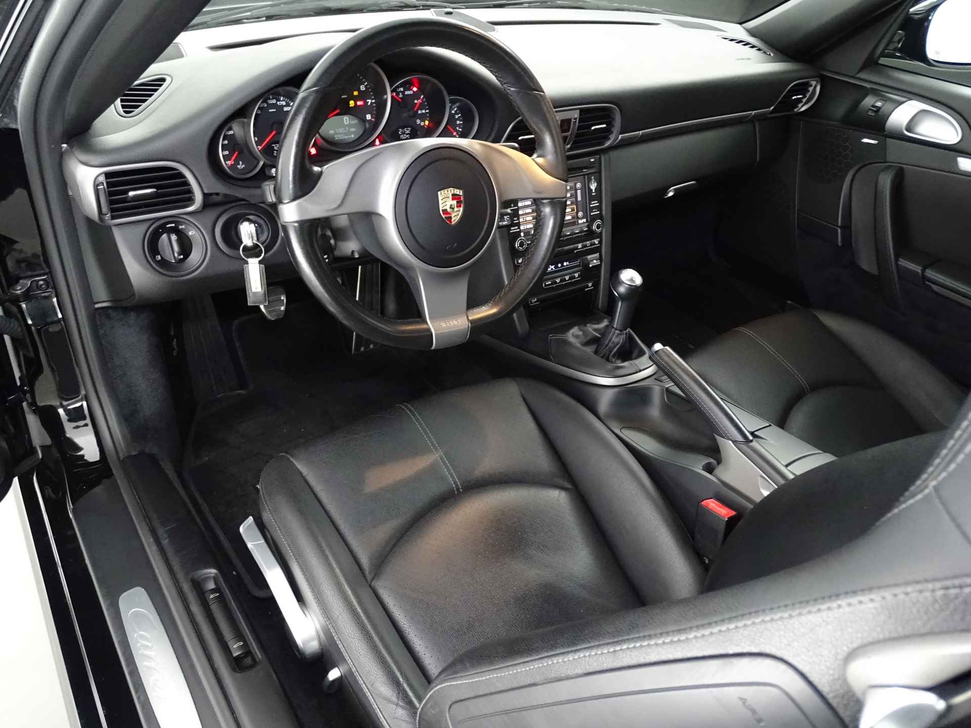 Porsche 911 997.2 3.6 Carrera Handgeschakeld Schuifdak, Stoelverwarming, Navigatie, Bose inst. - 11/103