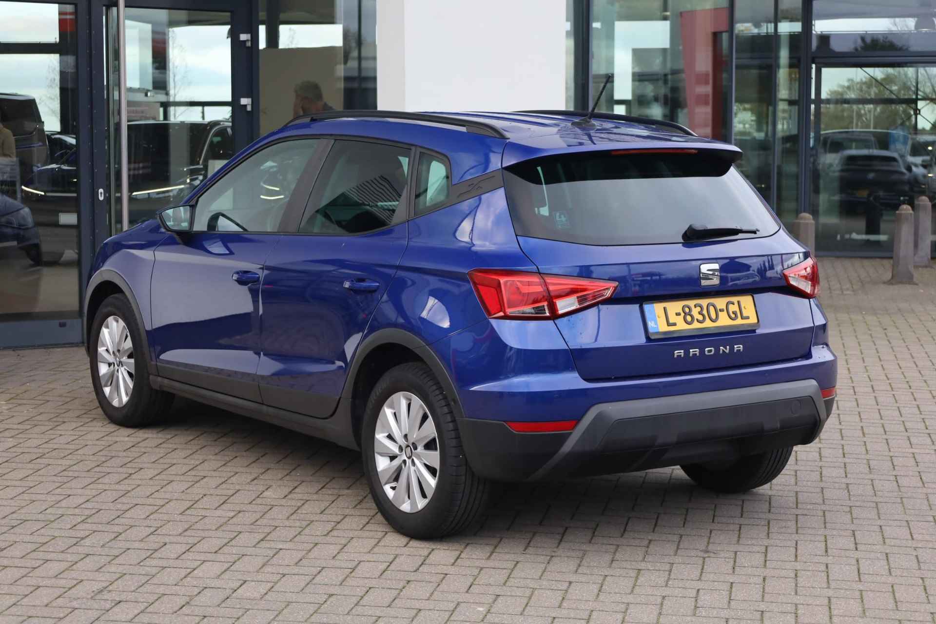 SEAT Arona 1.0 TSI Style Business Intense 95PK / 70kW, NL auto dealer onderhouden, navigatie, keyless, park assist, 16" LMV, achteruitrijcamera, adaptieve cruise control (acc), privacy glas, Apple Carplay / Android Auto, dodehoek sensor (side assist) - 5/42