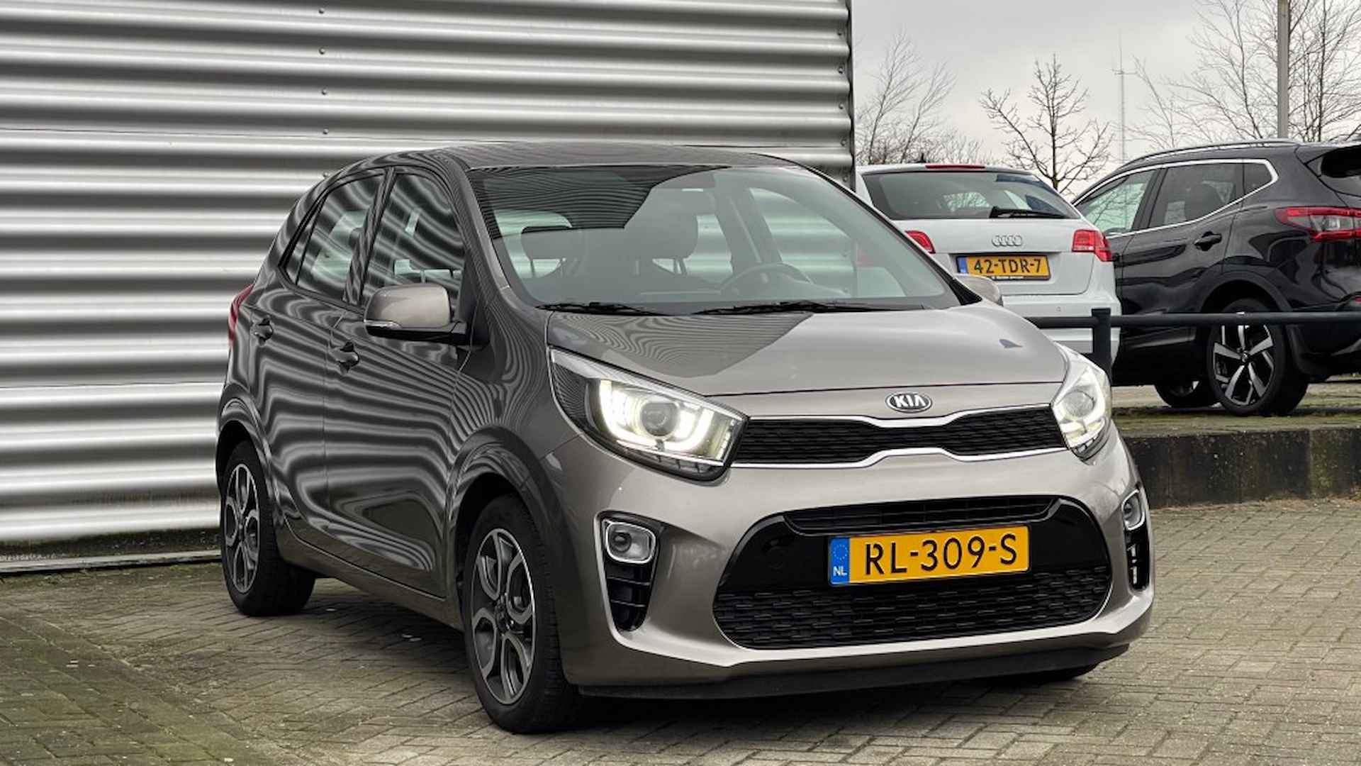 KIA Picanto 1.2 CVVT First Ed. Airco Navi Cruise Tel Camera Automaat - 10/27