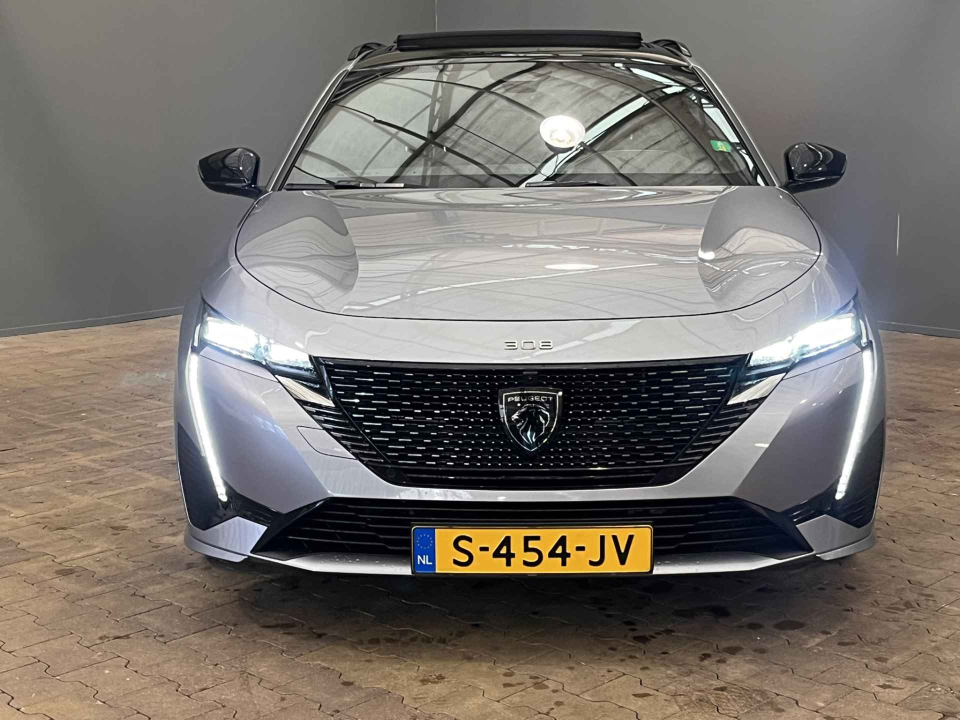 Peugeot 308 SW 1.6 180PK Hybrid GT | Panoramadak | Trekhaak | Elek.Stoel | Geheugen | Massage | Alcantara/Leder | Elek.Klep | 360 Camera | Stoelverwarming | Stuurverwarming | Carplay | Navigatie | Dode hoek | Bluetooth | - 12/39