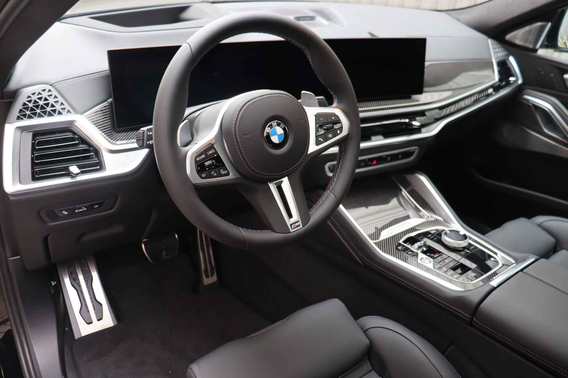 BMW X6 M60i xDrive High Executive Automaat / Panoramadak Sky Lounge / Massagefunctie / Adaptief M Onderstel Professional / Bowers & Wilkins / Parking Assistant Professional - 11/26