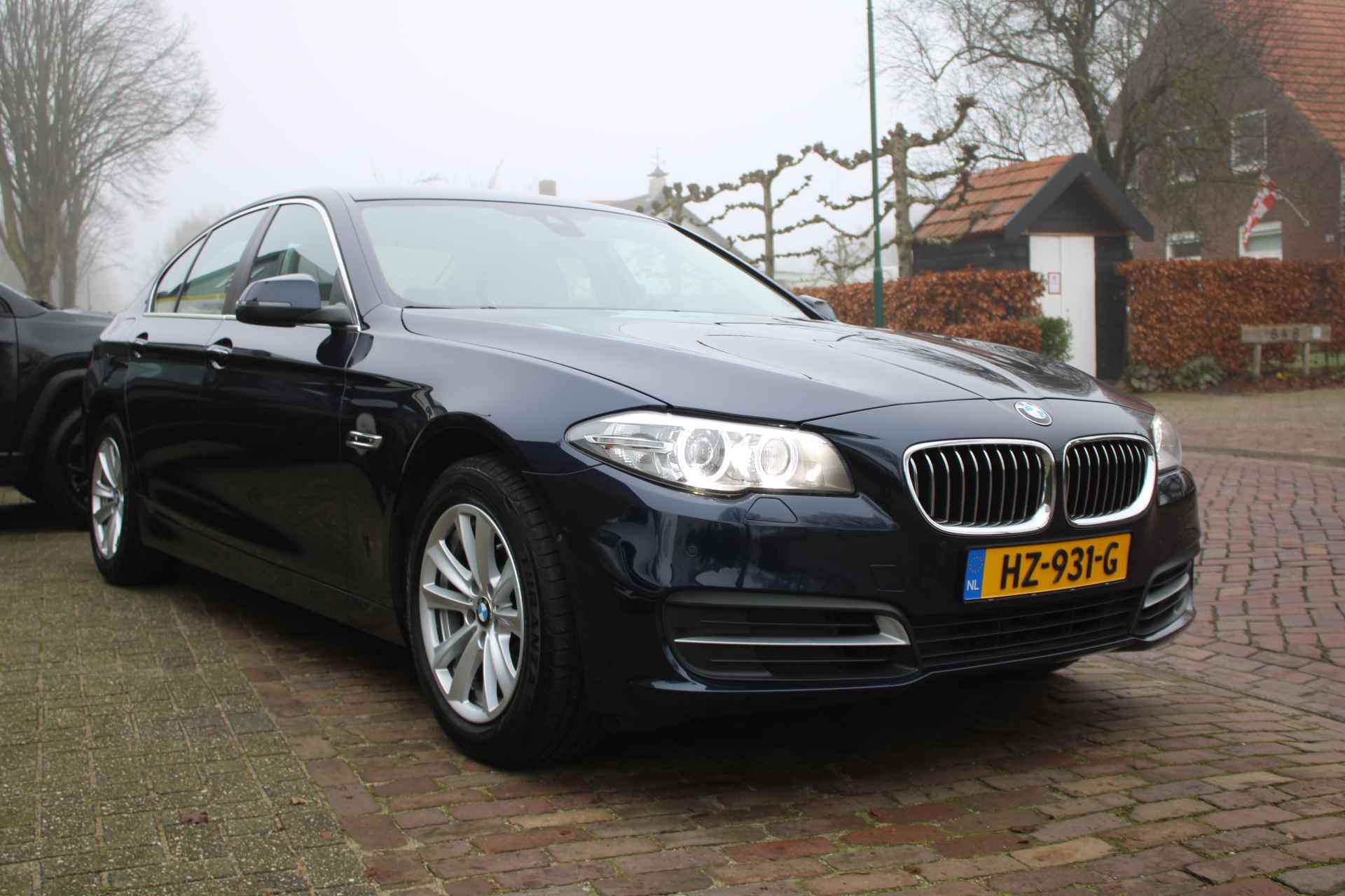 BMW 5-Serie 520i 184PK High Executive + 17"/ Navi/ Clima/ Cruise/ Leder/ Xenon/ Head-UP/ NL auto - 7/51