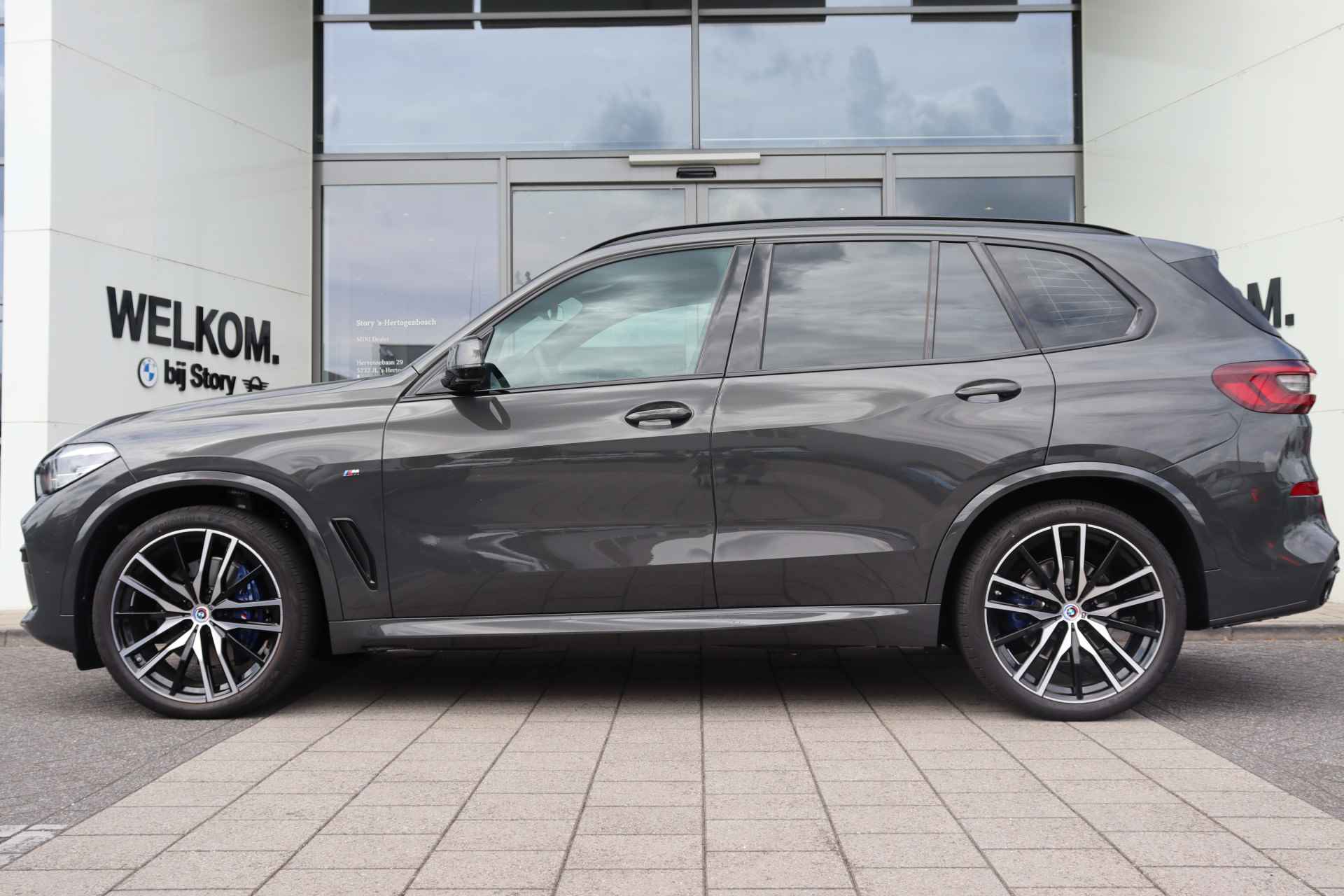 BMW X5 xDrive30d High Executive M Sport Automaat / BMW M 50 Jahre uitvoering / Panoramadak / Adaptief M Onderstel / Trekhaak / Active Steering / Parking Assistant Plus / Comfort Access - 7/23