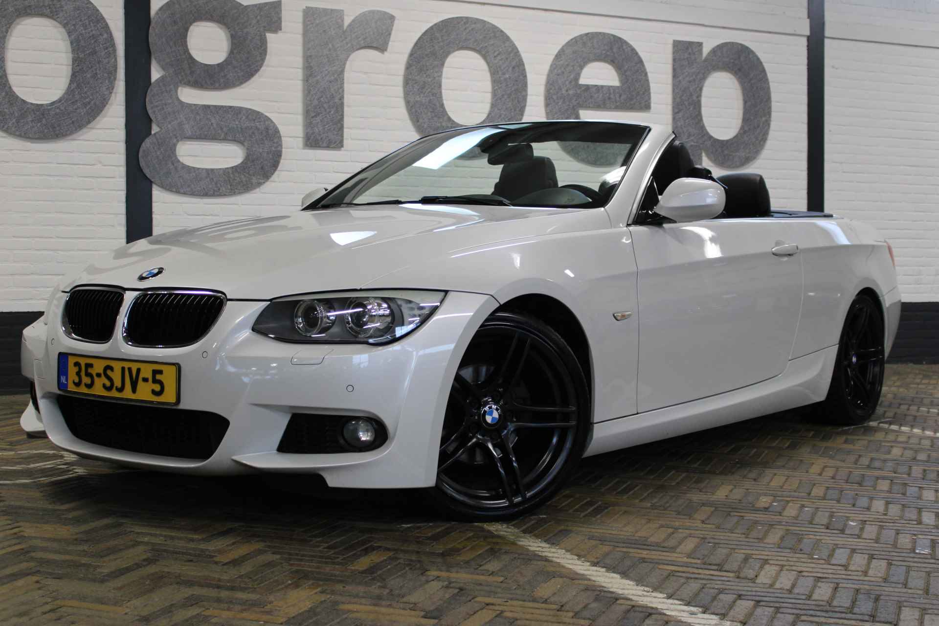 BMW 3 Serie Cabrio 320i Sport Edition M-sport | Hard top | Cruise control | Climate control | Bluetooth | M-sport pakket | Harman/Kardon audio | Memory seat | Parelmoer | - 7/66