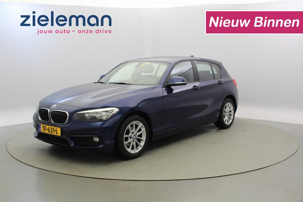 BMW 1-serie 118i 5 deurs Executive Sport Automaat - Leer, Navi, Cruise bij viaBOVAG.nl