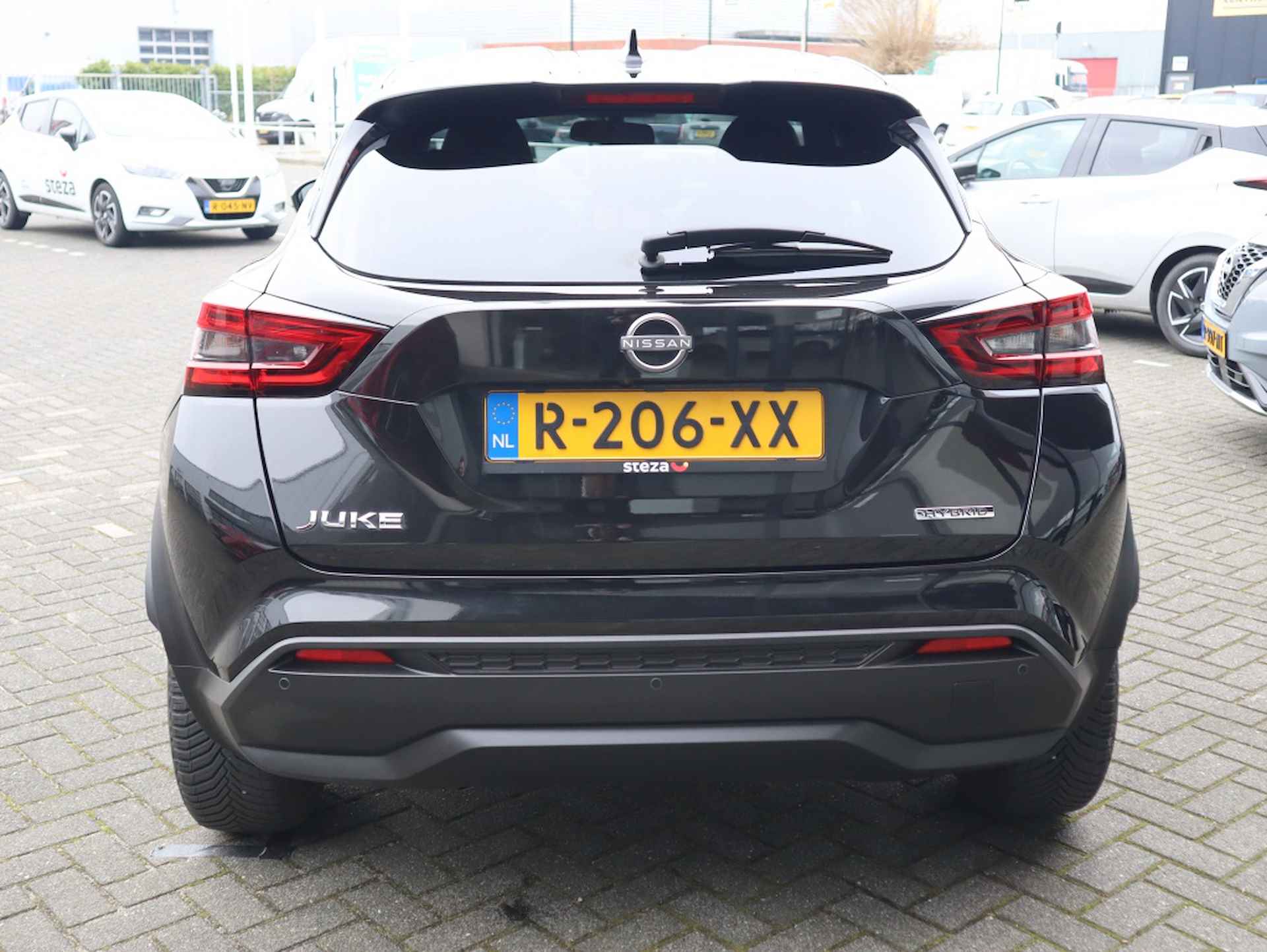 Nissan Juke 1.6 Hybride 143PK N-Connecta / All Season / Navigatie / Apple Ca - 7/27