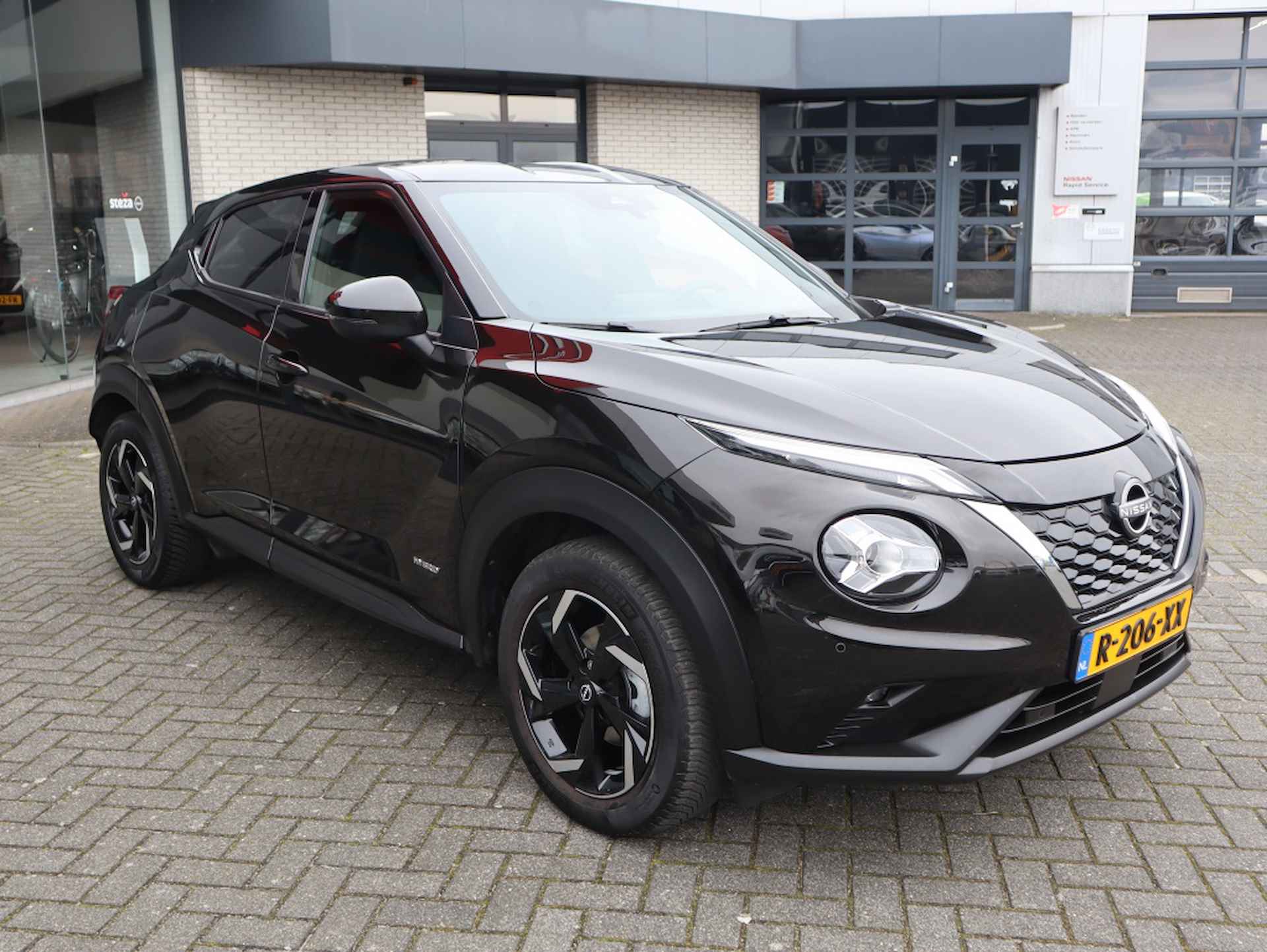 Nissan Juke 1.6 Hybride 143PK N-Connecta / All Season / Navigatie / Apple Ca - 13/27