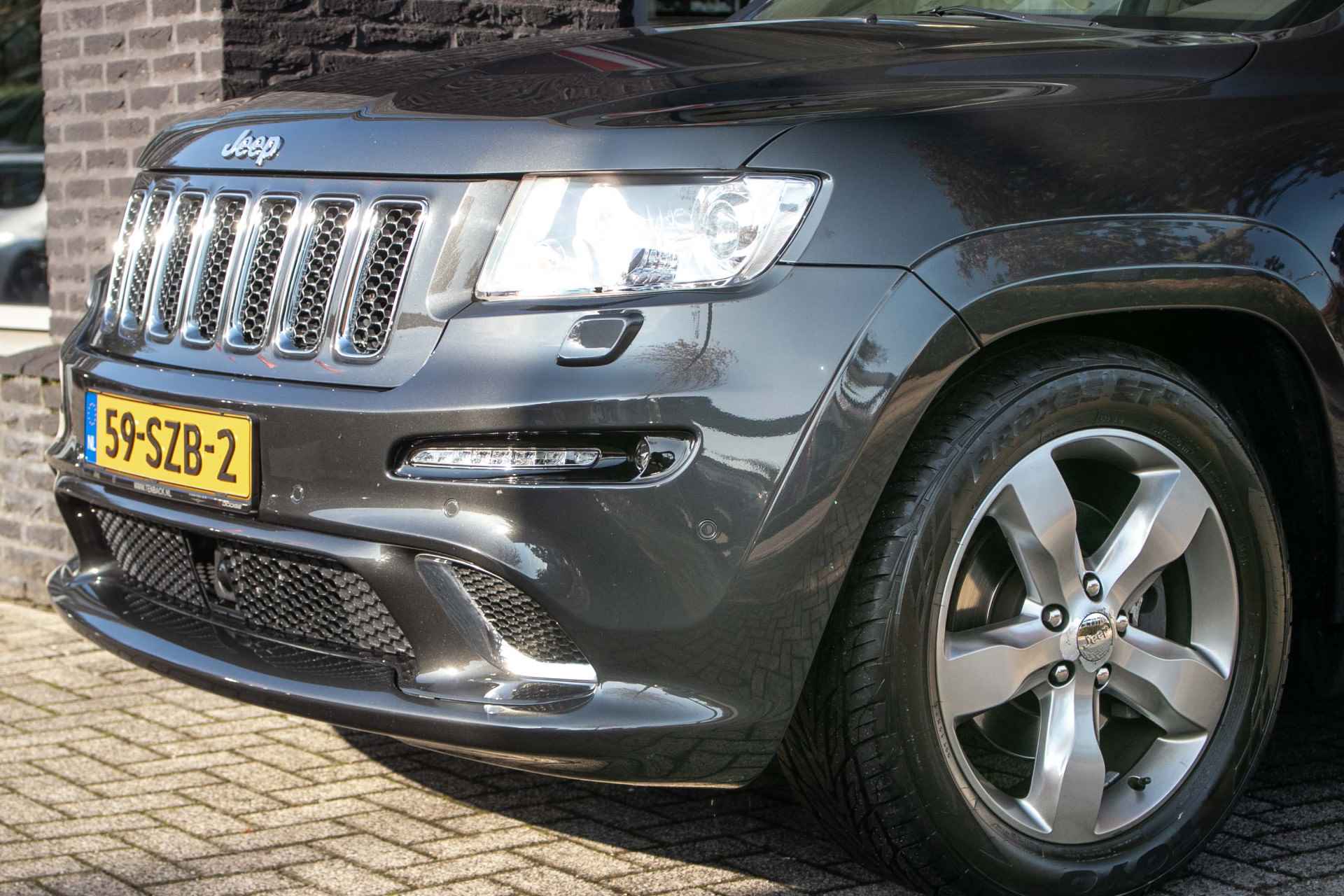 Jeep Grand Cherokee 3.6L V6 Overland SRT-uitgevoerd - All-in rijklrprs | Volledig uitgerust | Orig. NL | Trekhaak - 36/48