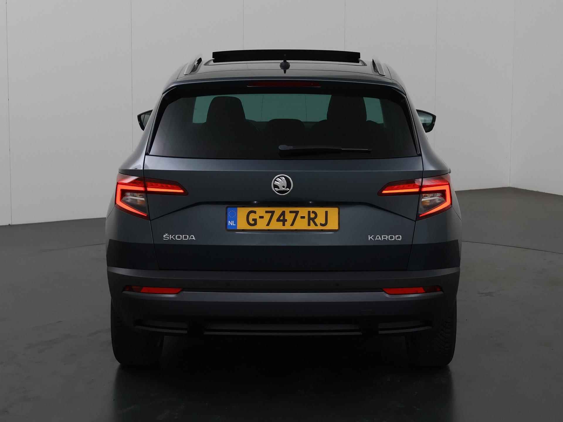 Skoda Karoq 1.0 TSI Ambition Business | Trekhaak | Panoramadak | Virtual Cockpit | Parkeercamera | Navigatie | Stoelverwarming | Climate Control | DAB | - 5/39