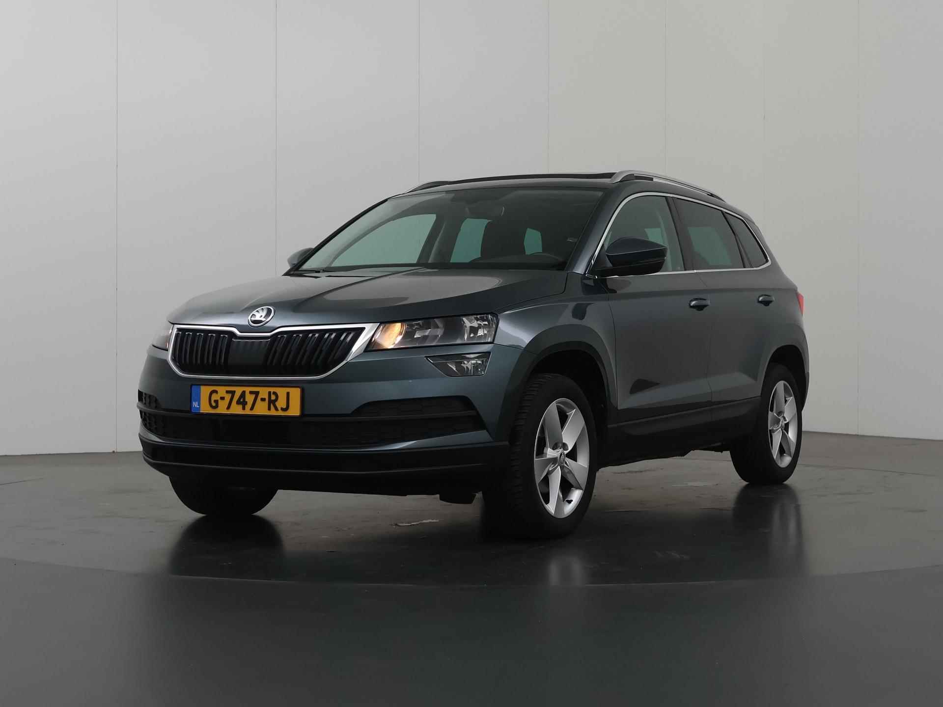 Skoda Karoq 1.0 TSI Ambition Business | Trekhaak | Panoramadak | Virtual Cockpit | Parkeercamera | Navigatie | Stoelverwarming | Climate Control | DAB | - 39/39