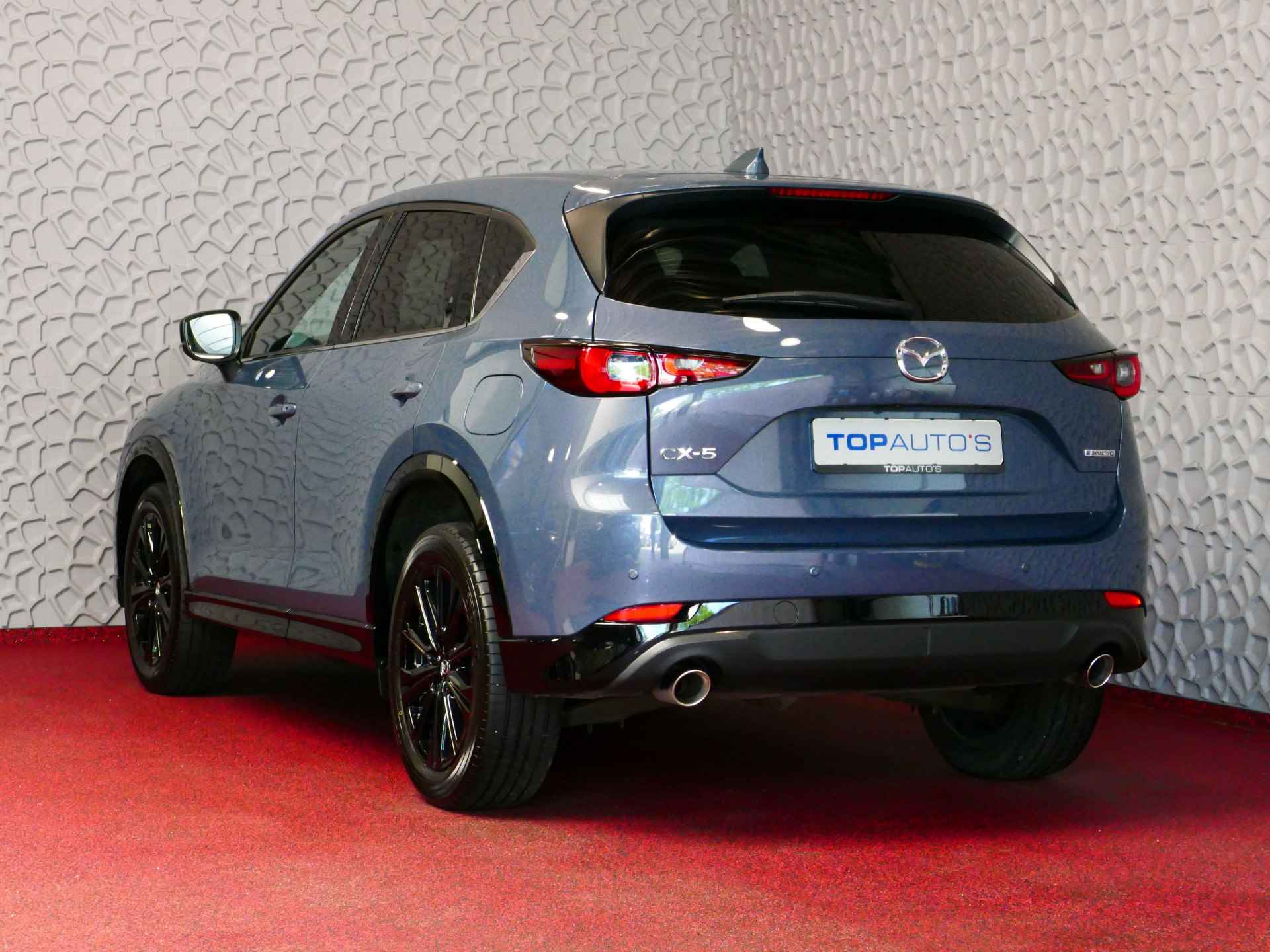 Mazda CX-5 E-SKYACTIV MHEV 2.0 165 PK HOMURA LEER BOSE ELEK.KLEP HEADUP 360.CAMERA 19''LMV FULL LED CARPLAY NAVI STOEL/STUUR VERW. STOELKOE 05/2024 - 2/79