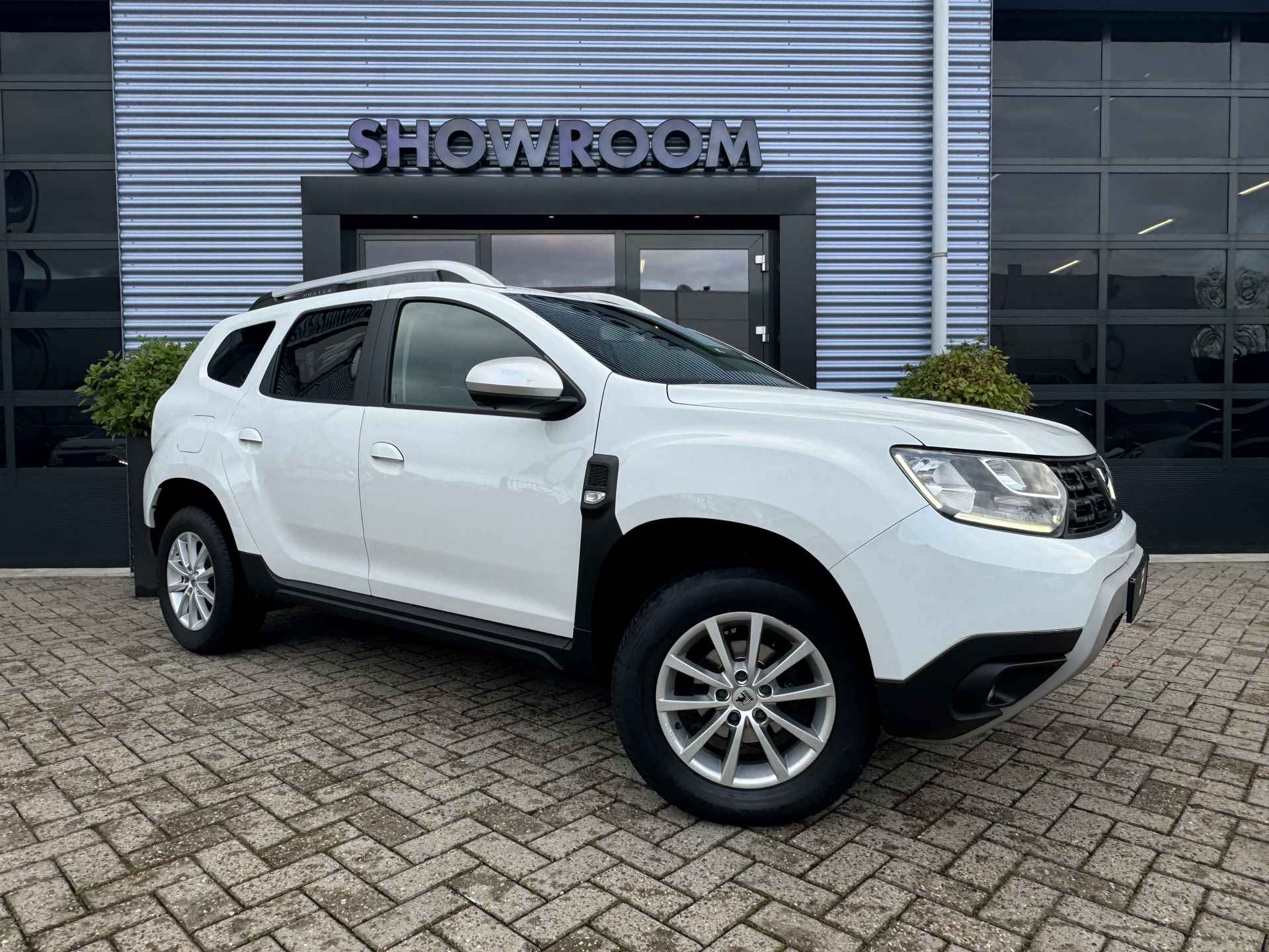 Dacia DUSTER 1.6 SCe Comfort Navi|Camera|Cruise|Airco| 2 velgensets - 11/33