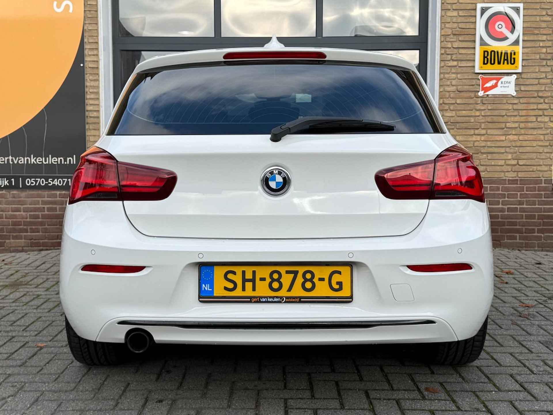 BMW 1-serie 116i SPORTLINE NAVI/SPORTSTOELEN/LED/LMV/PDC/NL-AUTO/56.000 KM! - 19/46