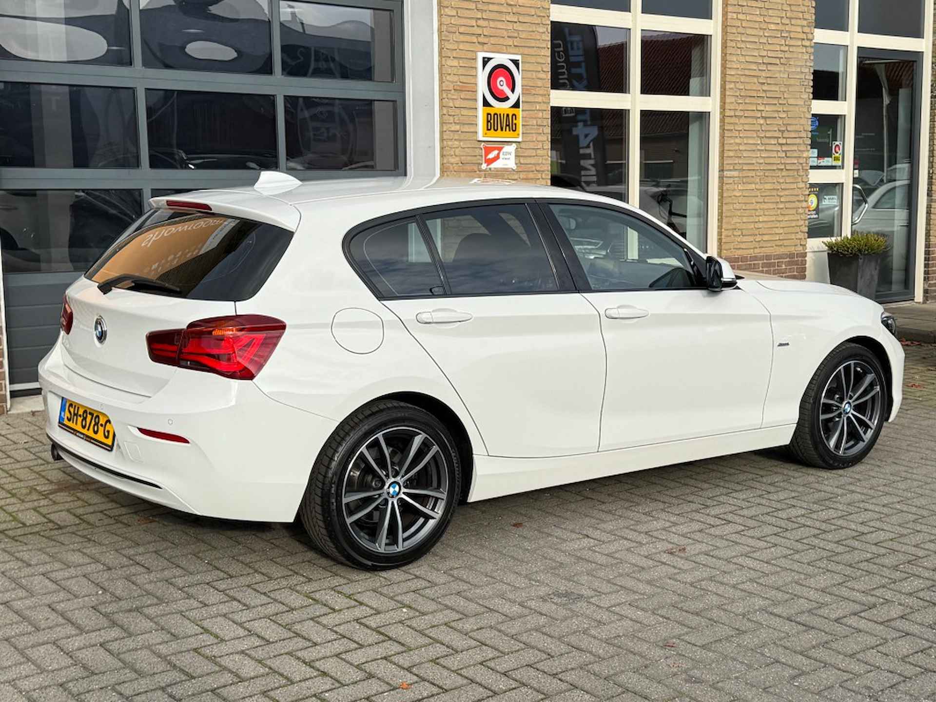 BMW 1-serie 116i SPORTLINE NAVI/SPORTSTOELEN/LED/LMV/PDC/NL-AUTO/56.000 KM! - 42/46