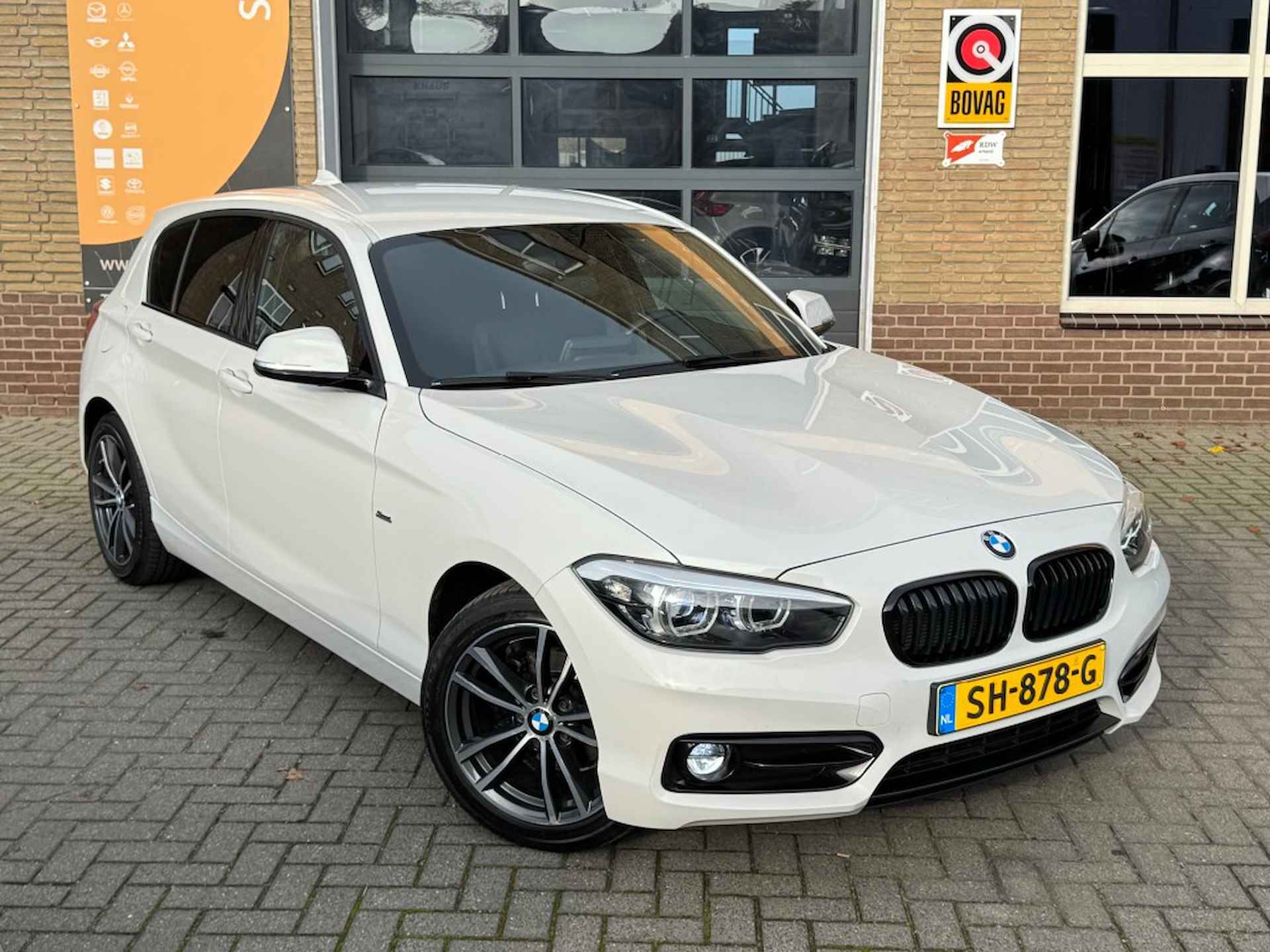 BMW 1-serie 116i SPORTLINE NAVI/SPORTSTOELEN/LED/LMV/PDC/NL-AUTO/56.000 KM! - 45/46