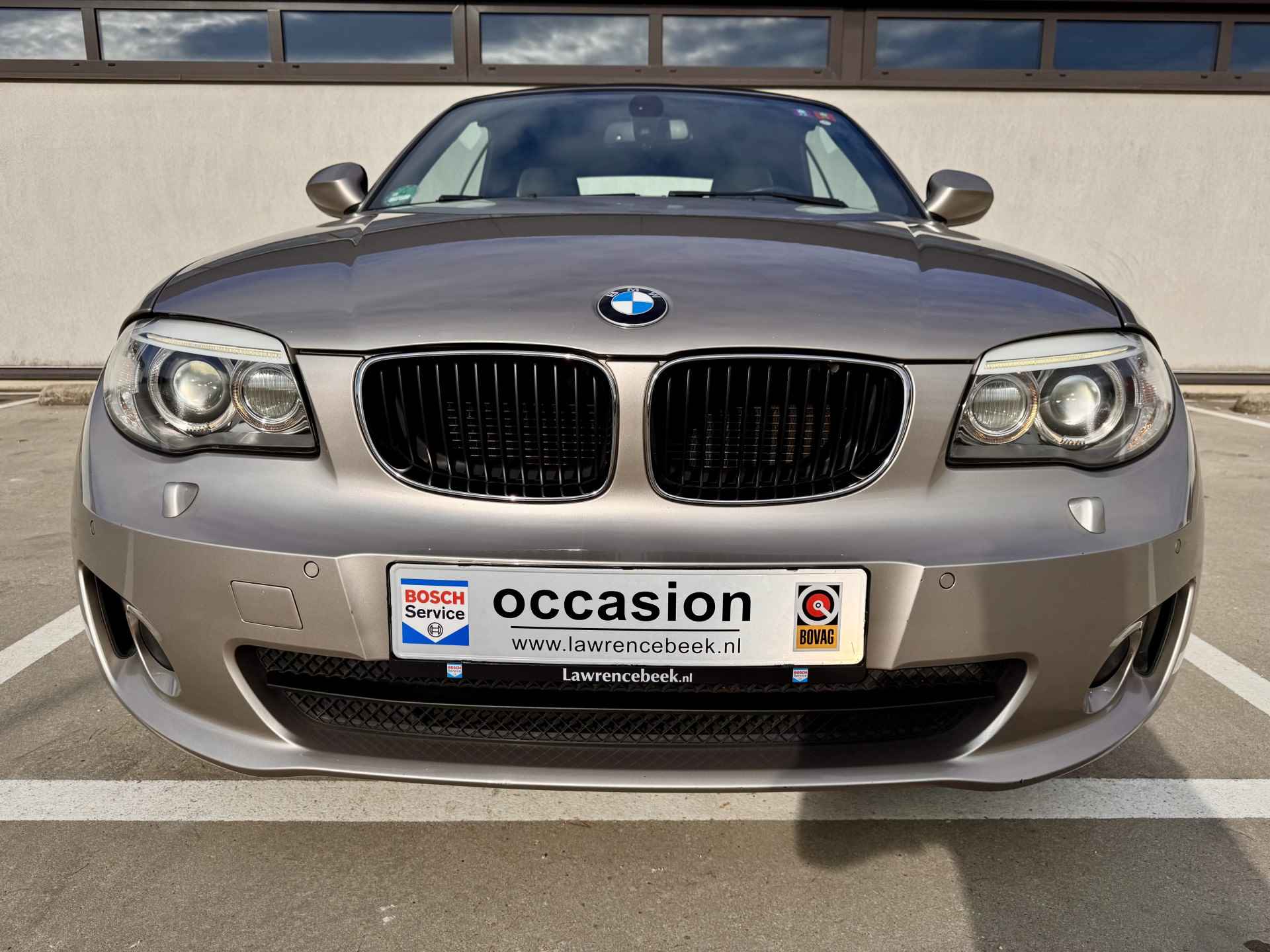 BMW 1 Serie Cabrio 120i High Executive | Leer | Standkachel | Navi | Als nieuw | % Bovag Occasion Partner % - 13/38