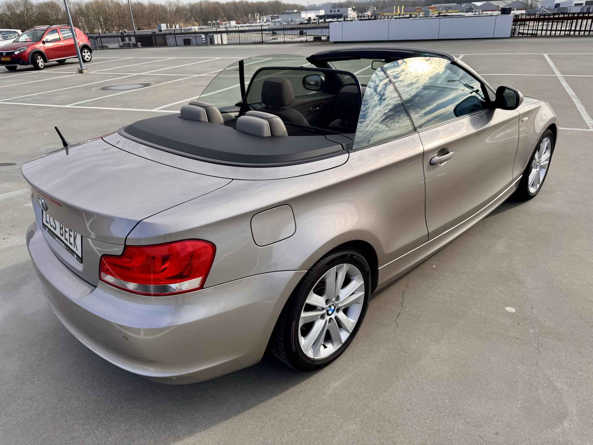 BMW 1 Serie Cabrio 120i High Executive | Leer | Standkachel | Navi | Als nieuw | % Bovag Occasion Partner % - 37/38