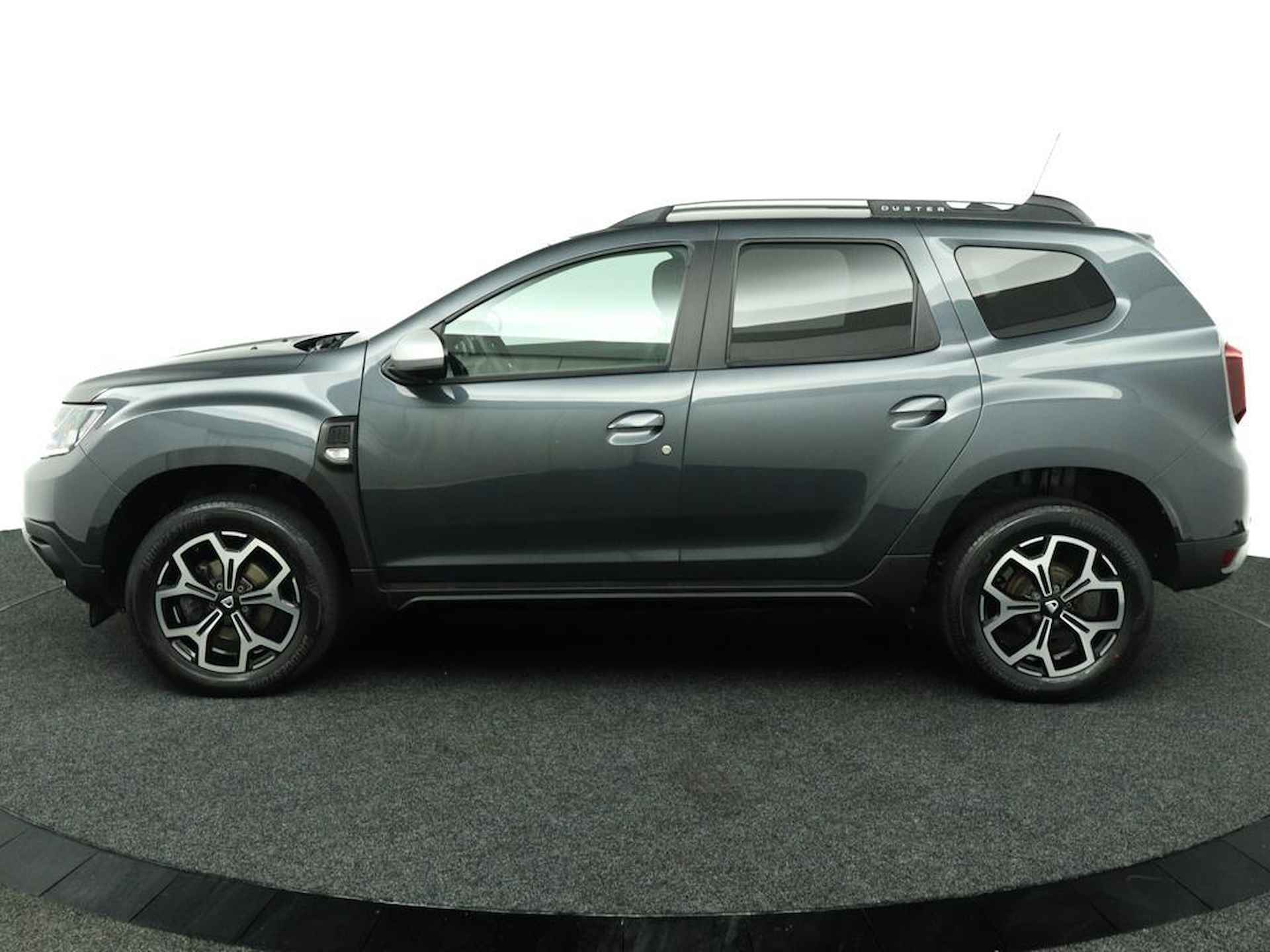 Dacia Duster 1.3 TCe Prestige | Trekhaak | 360 Camera | Navigatie | Stoelverwarming | Dode Hoek Detectie | Getint Glas | Metallic Lak | LED | Licht Metalen Velgen | Keyless Entry | Incl. Winterset | - 2/48