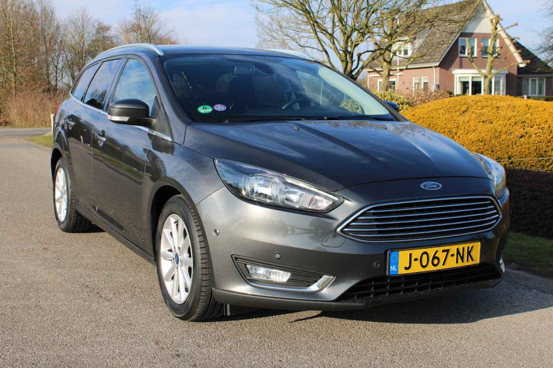 FORD Focus Wagon 1.0 125pk Titanium ECC/cruise/navi/park ass/trekhaak - 18/38