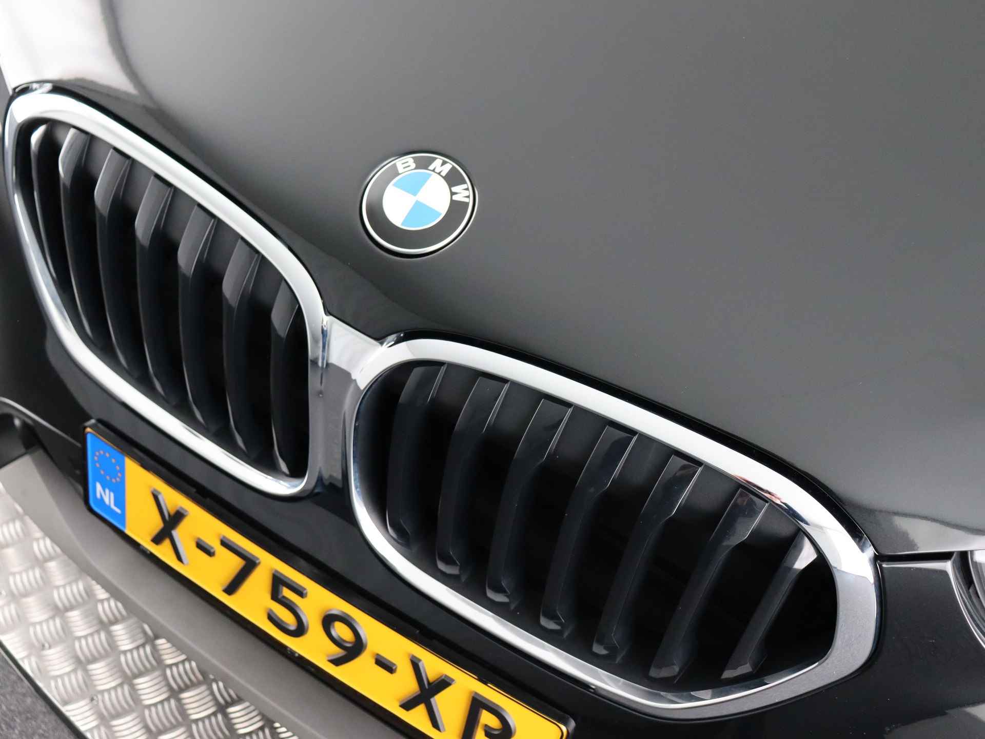 BMW X1 sDrive18i Business Edition Plus (Leer / PDC / Voorstoelen Verwarmd / Navi Plus / Cruise / DAB) - 26/54