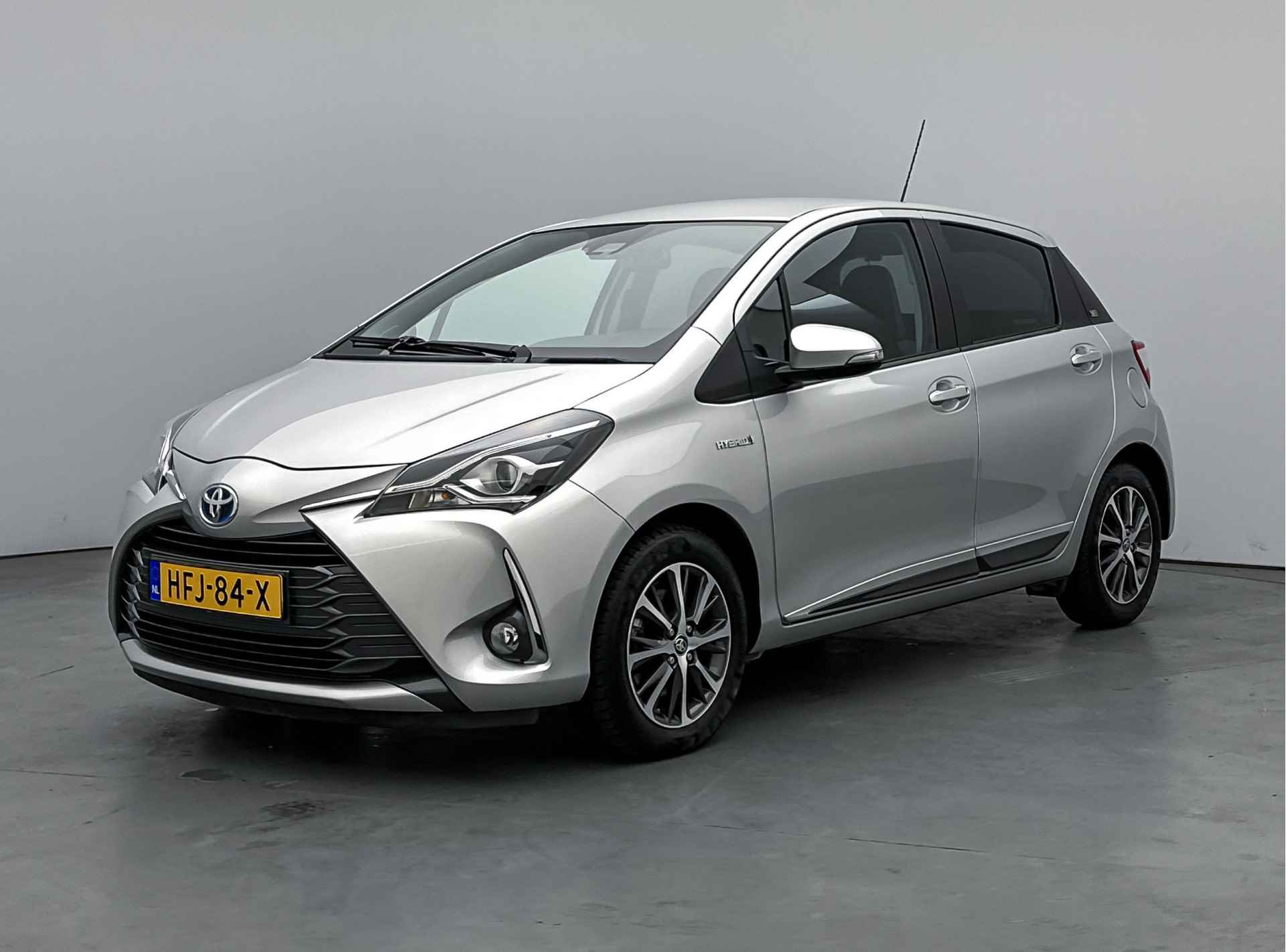 Toyota Yaris 1.5 Hybrid Dynamic Limited | Navigatie | Climate Control | LM Velgen | Parkeersensoren | - 19/52