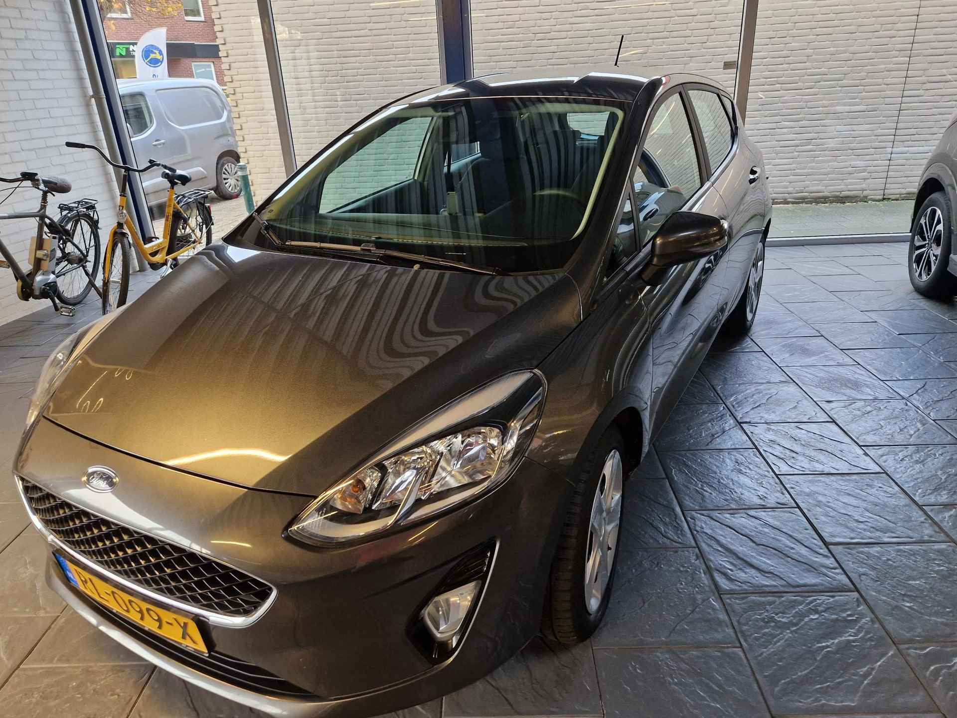 Ford Fiesta 1.1 Trend Ned.auto- trekhaak - 4 seizoenenbanden - 4/28