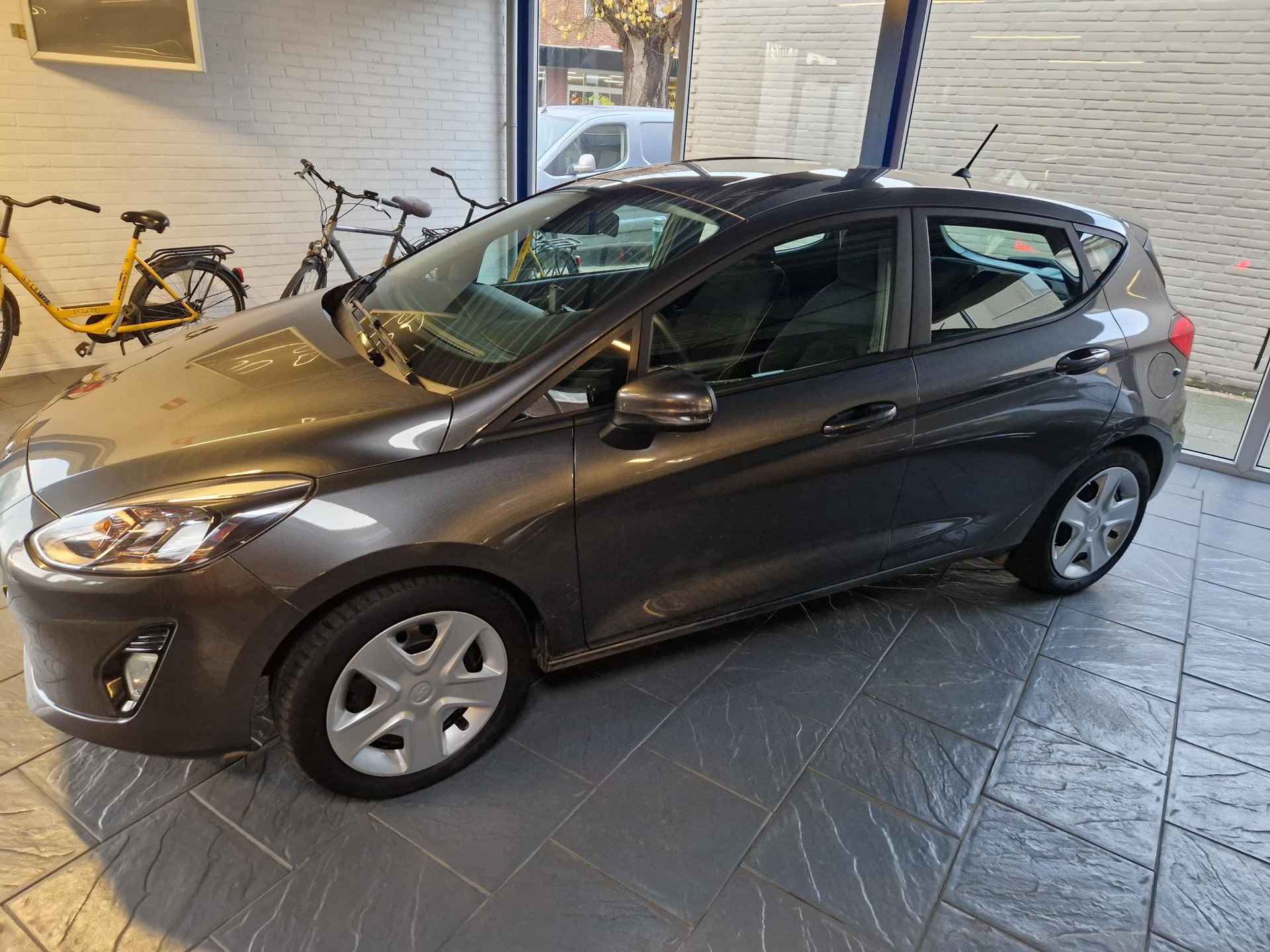 Ford Fiesta 1.1 Trend Ned.auto- trekhaak - 4 seizoenenbanden - 6/28