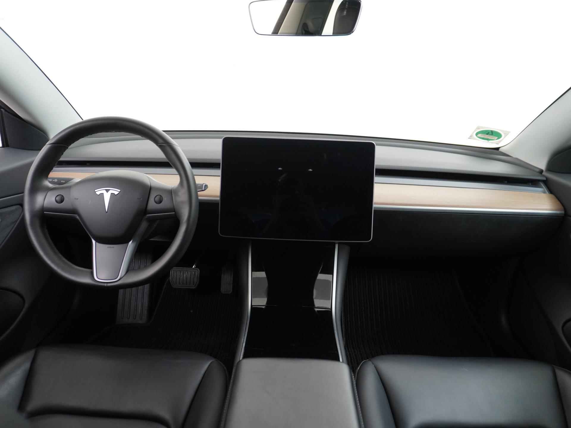 Tesla Model 3 Standard RWD Plus 60 kWh VAN 25.900 VOOR 20.877 EINDEJAARSVOORDEEL 5.023 | RIJKLAAR INCL. 12 MAANDEN BOVAGGARANTIE - 23/45