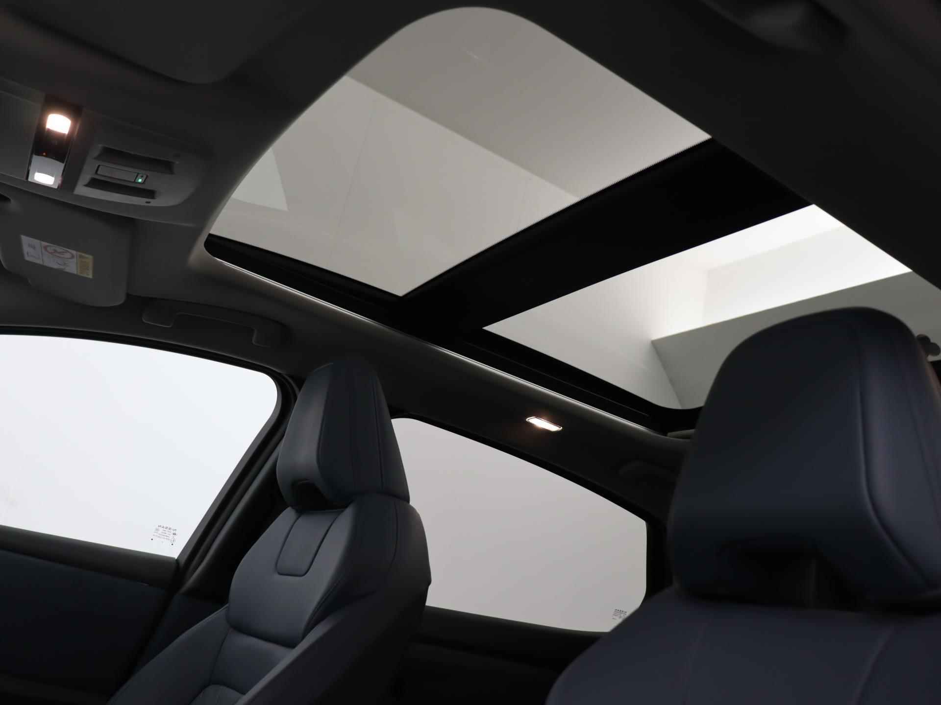 Nissan Ariya Evolve 87 kWh Leather | ACC | e-Pedal | Stoelverwarming voor + achter | Panoramadak | Elektrisch verstelbaar armsteun - 31/41
