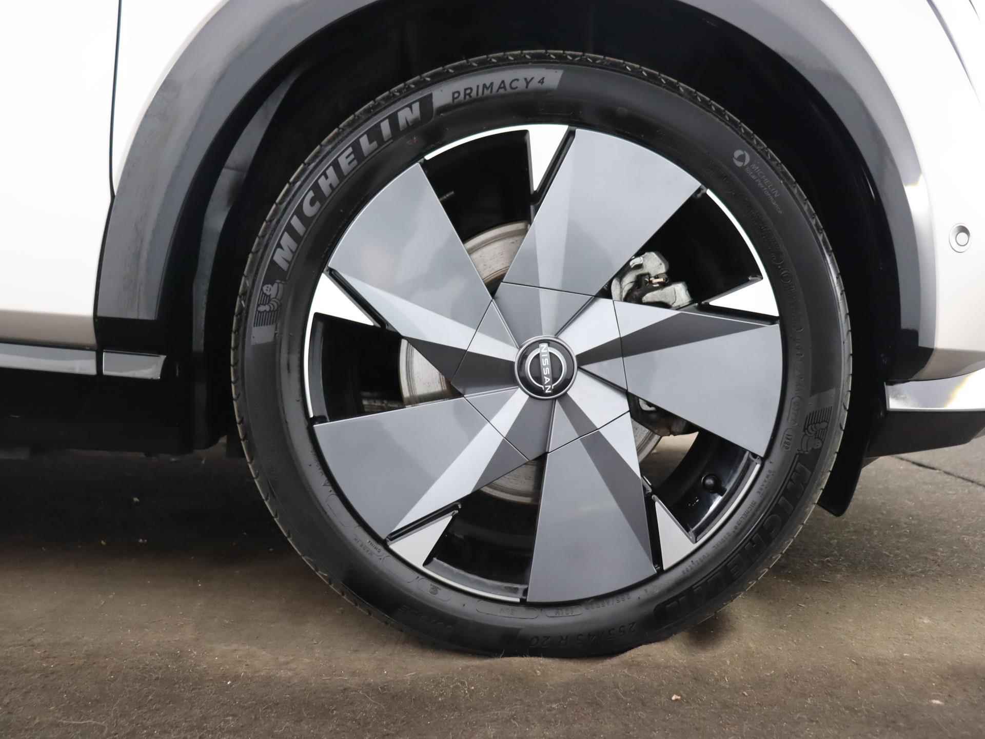 Nissan Ariya Evolve 87 kWh Leather | ACC | e-Pedal | Stoelverwarming voor + achter | Panoramadak | Elektrisch verstelbaar armsteun - 39/41