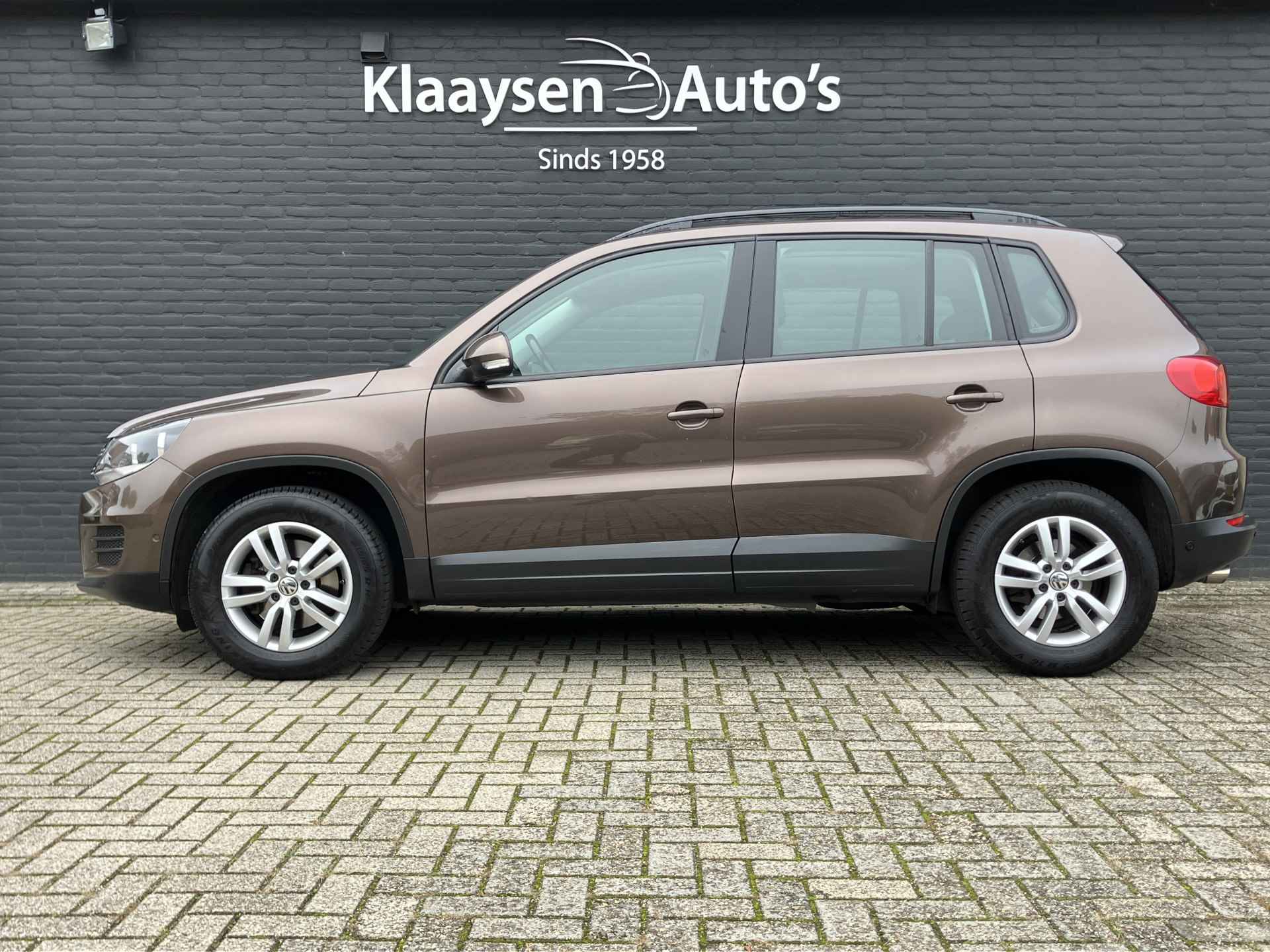 Volkswagen Tiguan 1.4 TSI Sport&Style 123 pk | panoramadak | trekhaak 1600 kg | climate control | parkeersensoren - 9/35