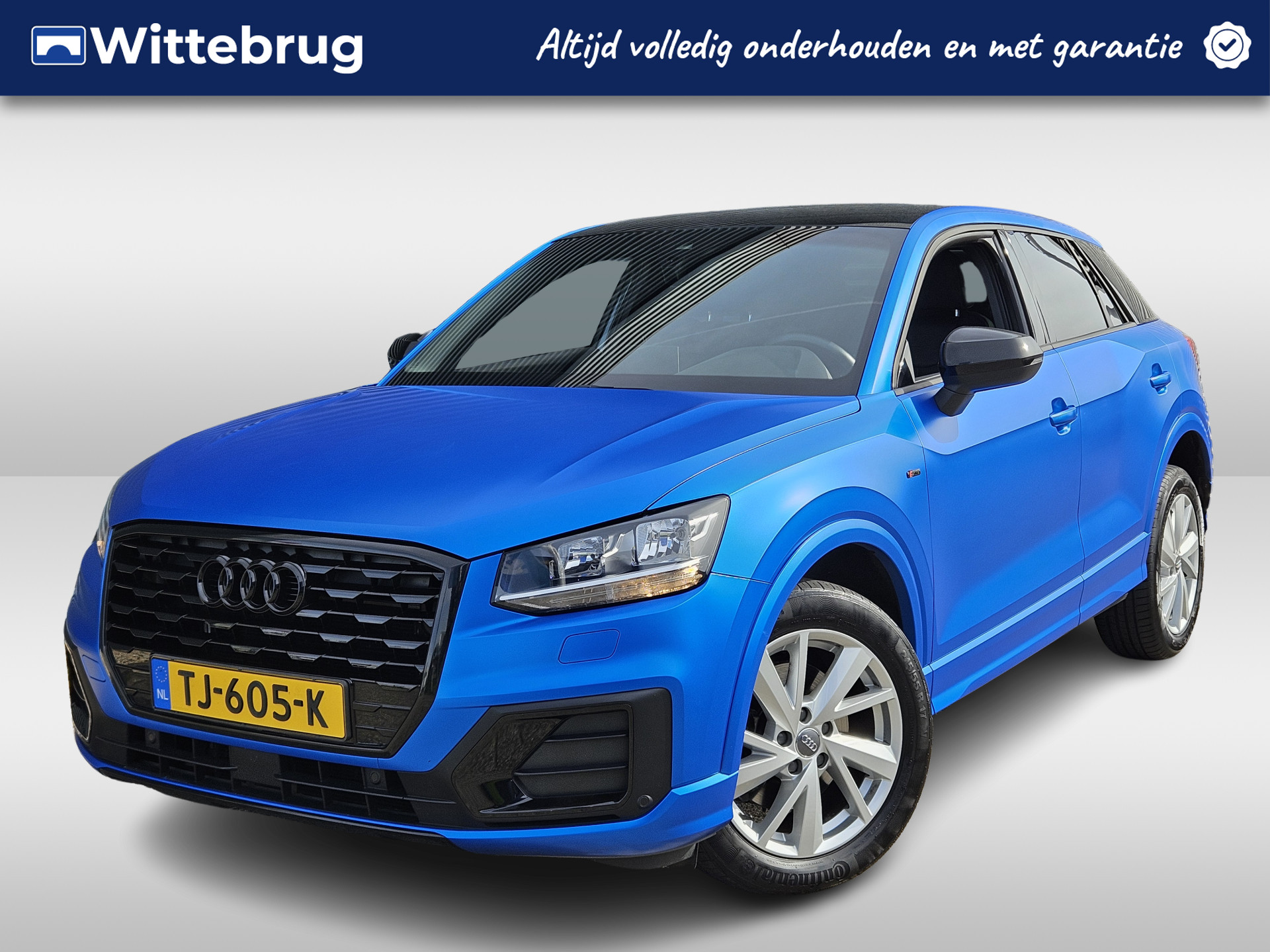 Audi Q2 1.0 TFSI Sport Pro Line Automaat | Navigatie | Mat Blauwe Wrap met Zwart Dak | S-Line Pakket bij viaBOVAG.nl