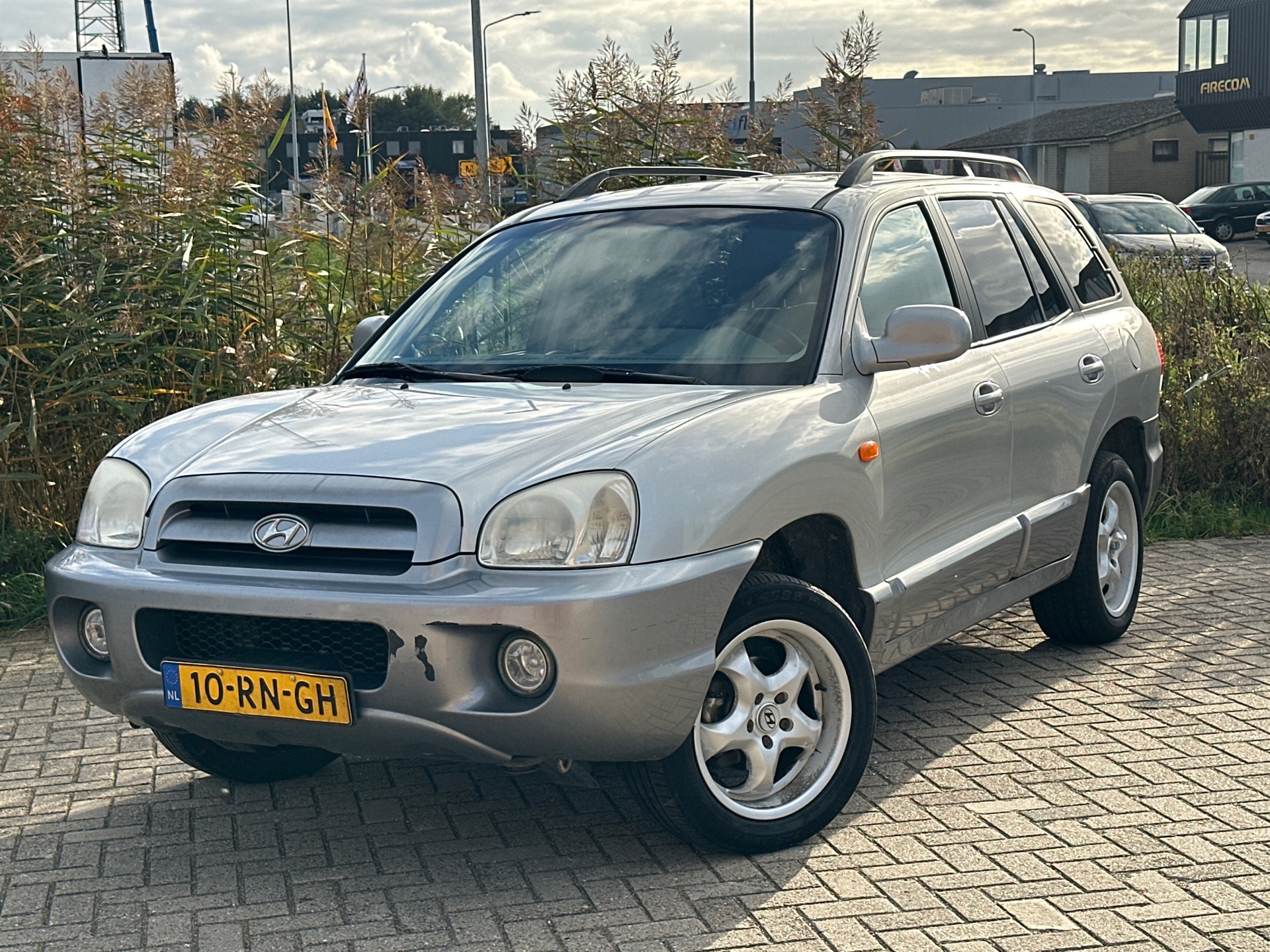 Hyundai Santa Fe 2.0i-16V Dynamic Motion Airco - Schuifdak - Navigatie -