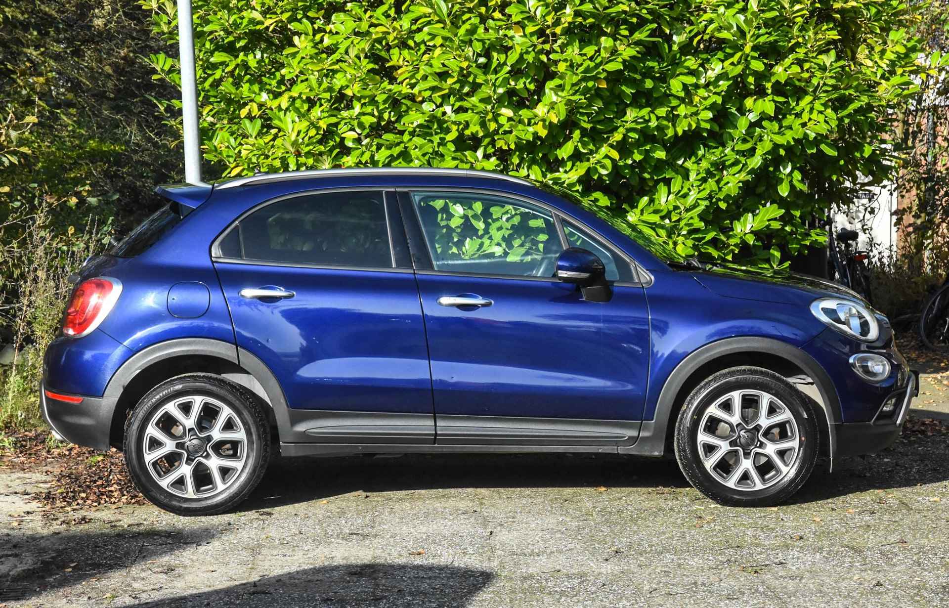 Fiat 500 X 1.4 Turbo MultiAir Lounge automaat / zwart leer/stof / stuurverwarming / stoelverwarming / airco / cruise control / navi / USB / privacy glass achter - 31/39