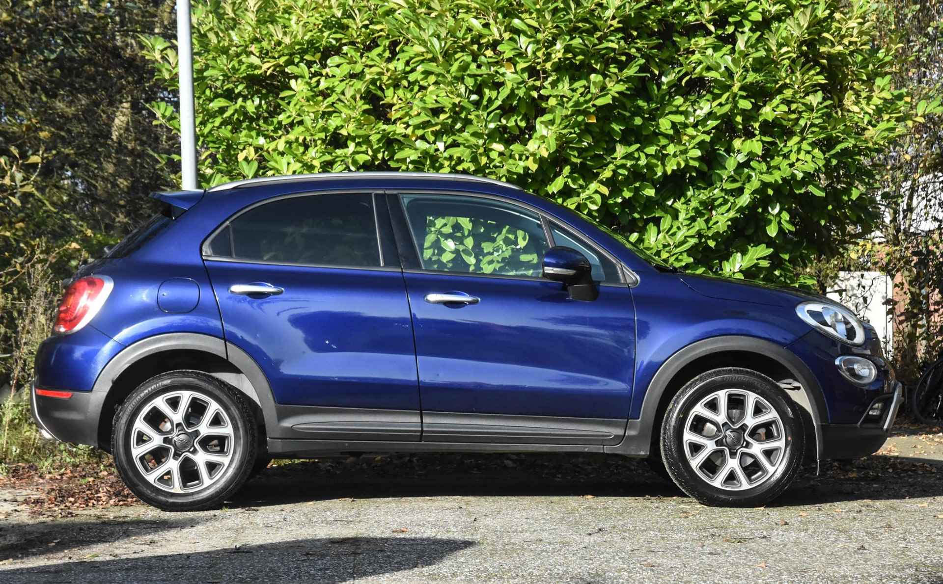 Fiat 500 X 1.4 Turbo MultiAir Lounge automaat / zwart leer/stof / stuurverwarming / stoelverwarming / airco / cruise control / navi / USB / privacy glass achter - 32/39