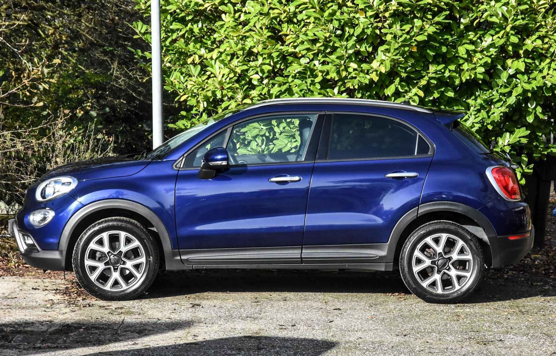 Fiat 500 X 1.4 Turbo MultiAir Lounge automaat / zwart leer/stof / stuurverwarming / stoelverwarming / airco / cruise control / navi / USB / privacy glass achter - 36/39