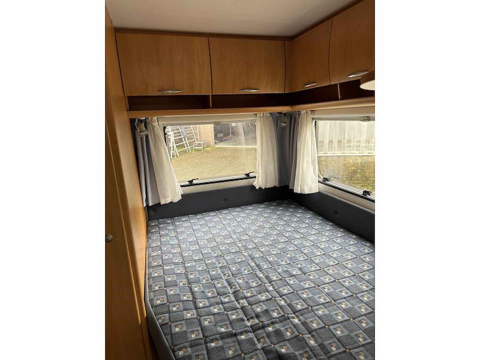 Eifelland Holiday 495 TF vast bed en rondzit - 17/25