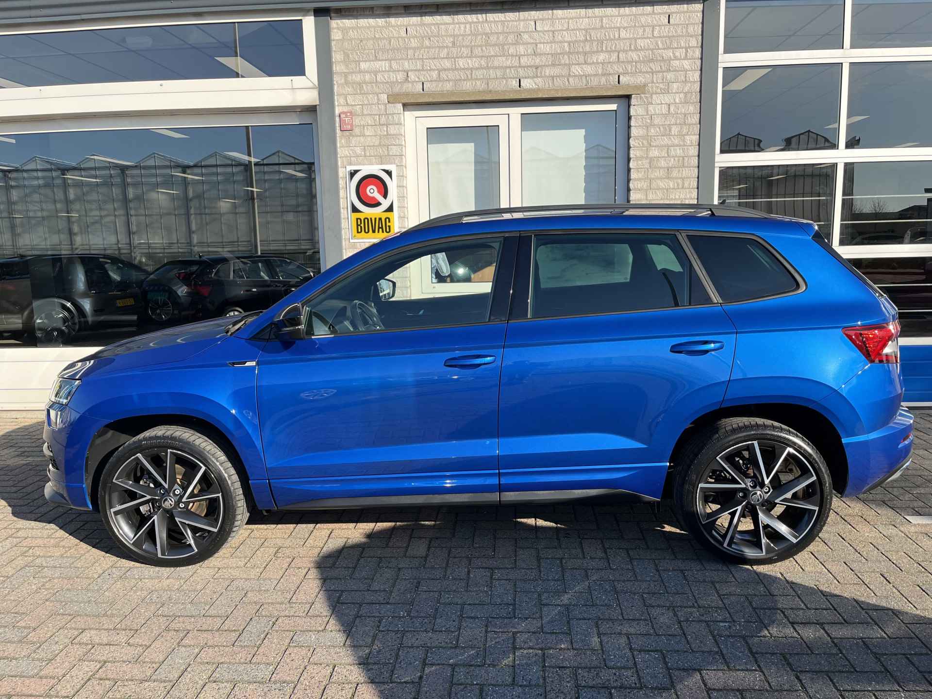 Škoda Karoq 1.5 TSI ACT Sportline Business / PANO/ KEYLESS/ DIGITAL DASH/ CRUISE/ PARK. SENSOREN/ SMARTLINK/ DAB/ CLIMA/ STOELVERWARMING V&A/ 19"LMV - 3/54