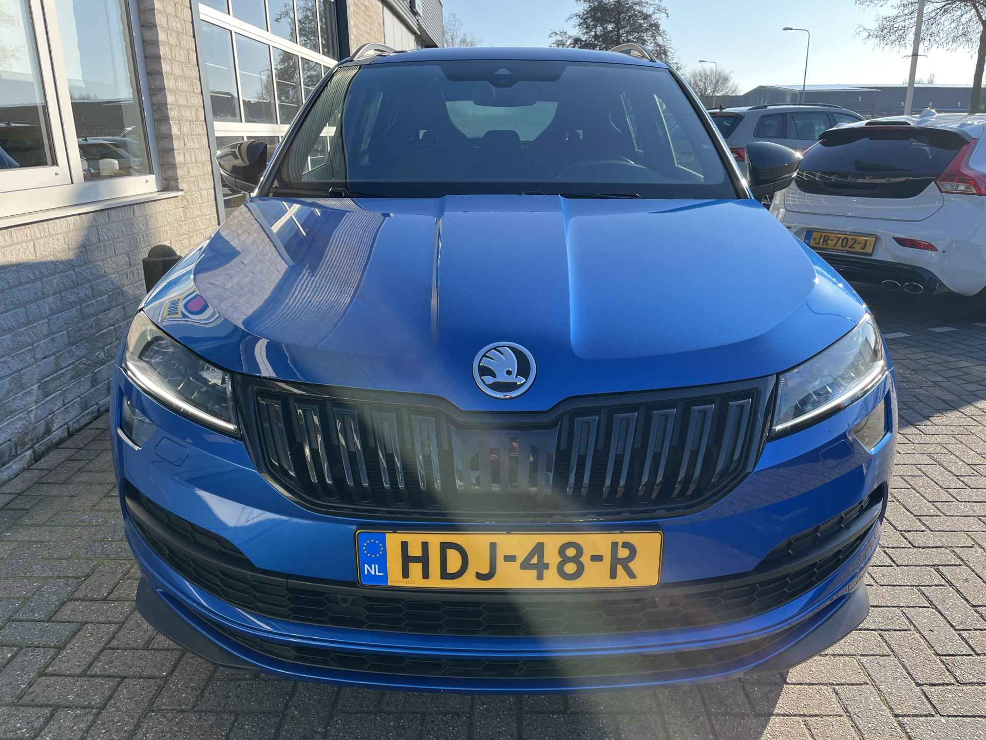 Škoda Karoq 1.5 TSI ACT Sportline Business / PANO/ KEYLESS/ DIGITAL DASH/ CRUISE/ PARK. SENSOREN/ SMARTLINK/ DAB/ CLIMA/ STOELVERWARMING V&A/ 19"LMV - 44/54