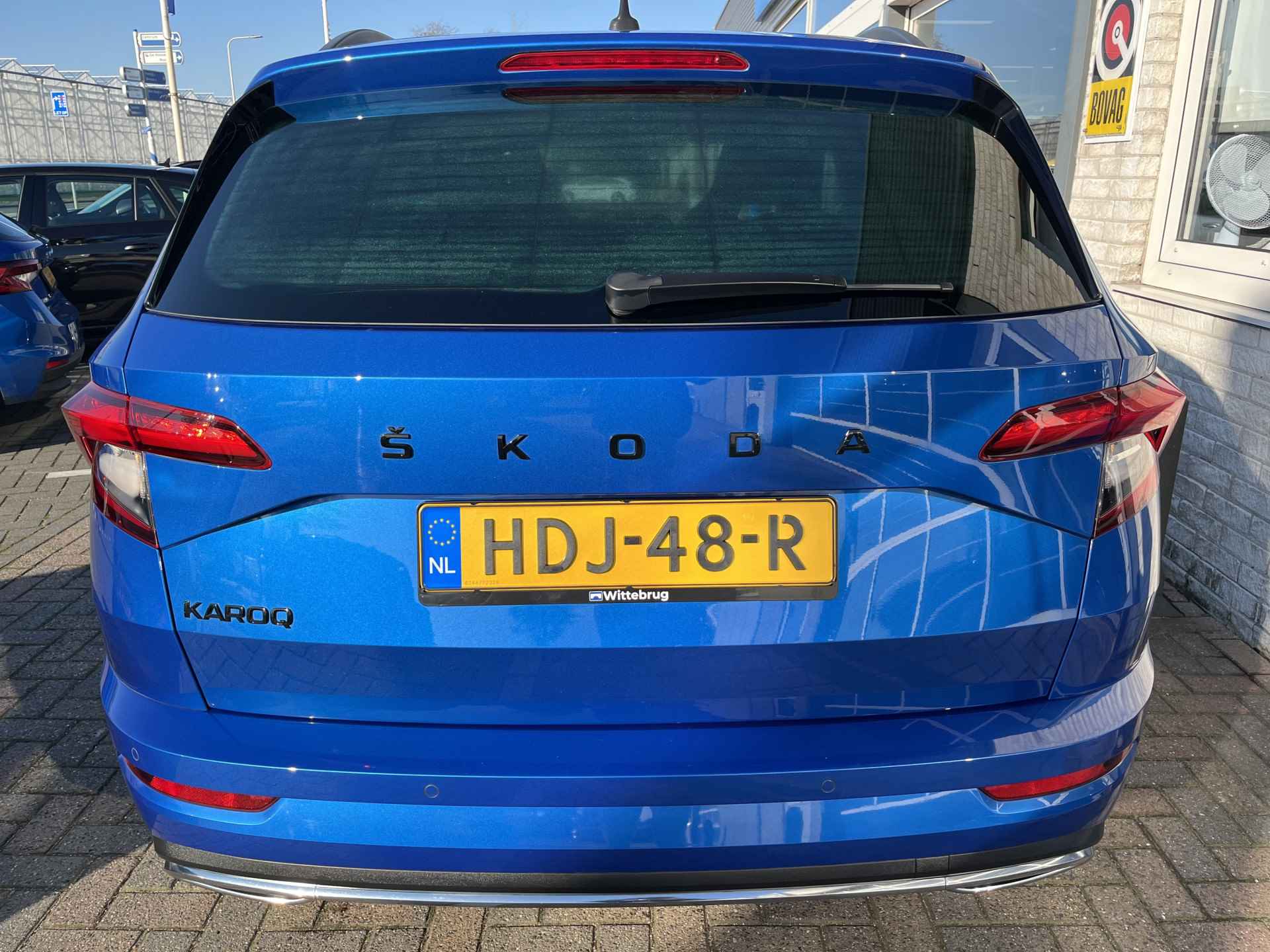 Škoda Karoq 1.5 TSI ACT Sportline Business / PANO/ KEYLESS/ DIGITAL DASH/ CRUISE/ PARK. SENSOREN/ SMARTLINK/ DAB/ CLIMA/ STOELVERWARMING V&A/ 19"LMV - 45/54