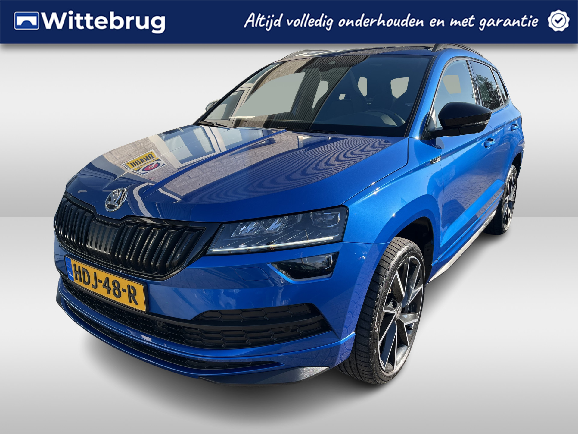 Škoda Karoq 1.5 TSI ACT Sportline Business / PANO/ KEYLESS/ DIGITAL DASH/ CRUISE/ PARK. SENSOREN/ SMARTLINK/ DAB/ CLIMA/ STOELVERWARMING V&A/ 19"LMV