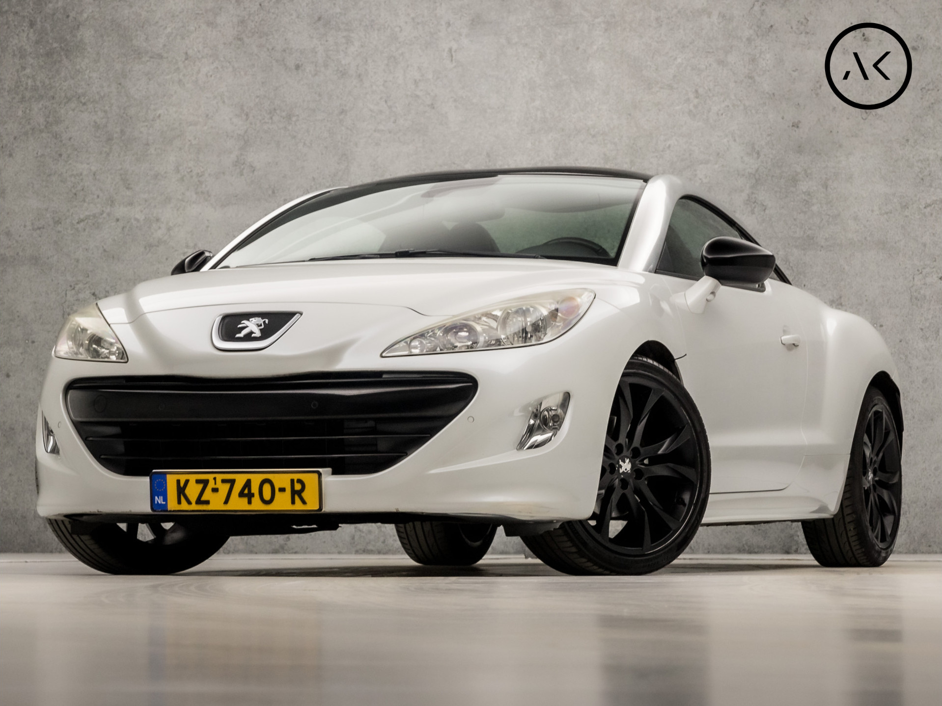 Peugeot RCZ 1.6 THP Black&White Sport 157Pk (ELEK SPORTSTOELEN, LEDER, STOELVERWARMING, KLOK, CLIMATE, PARKEERSENSOREN, CRUISE, ZWART HEMEL, NIEUWSTAAT)