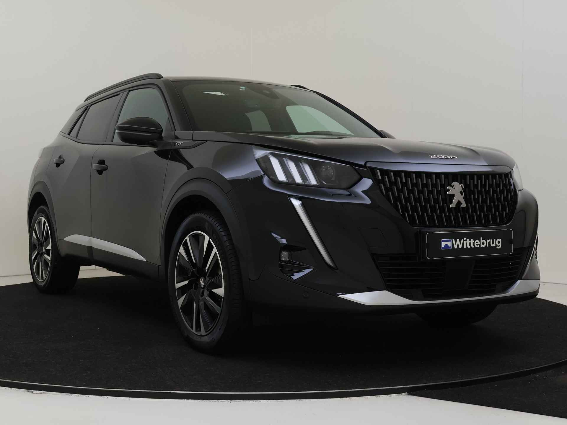 Peugeot 2008 1.2 PureTech GT Pack 155 pk Automaat | Navigatie | Panorama dak | Climate Control - 4/36