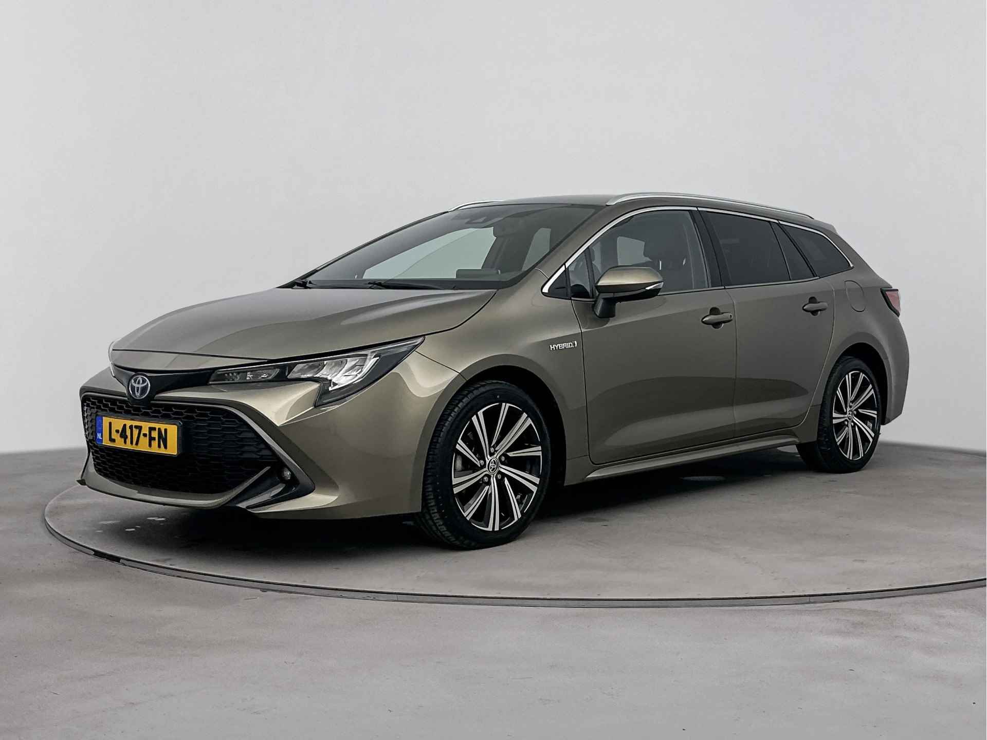 Toyota Corolla Touring Sports 1.8 Hybrid Dynamic | Stoelverwarming | Draadloze telefoonlader | LM velgen | Camera | Climate Control | Cruise Control Adaptief | - 14/43