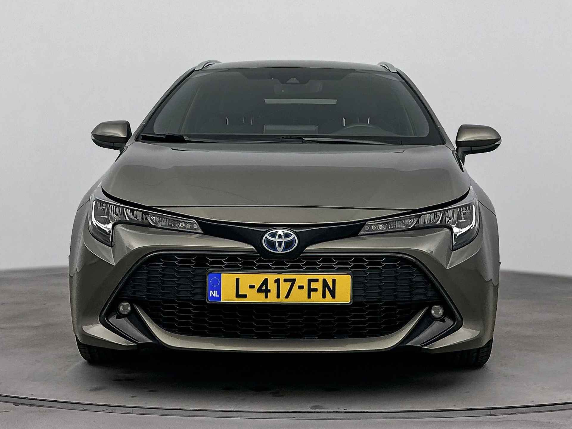 Toyota Corolla Touring Sports 1.8 Hybrid Dynamic | Stoelverwarming | Draadloze telefoonlader | LM velgen | Camera | Climate Control | Cruise Control Adaptief | - 35/43