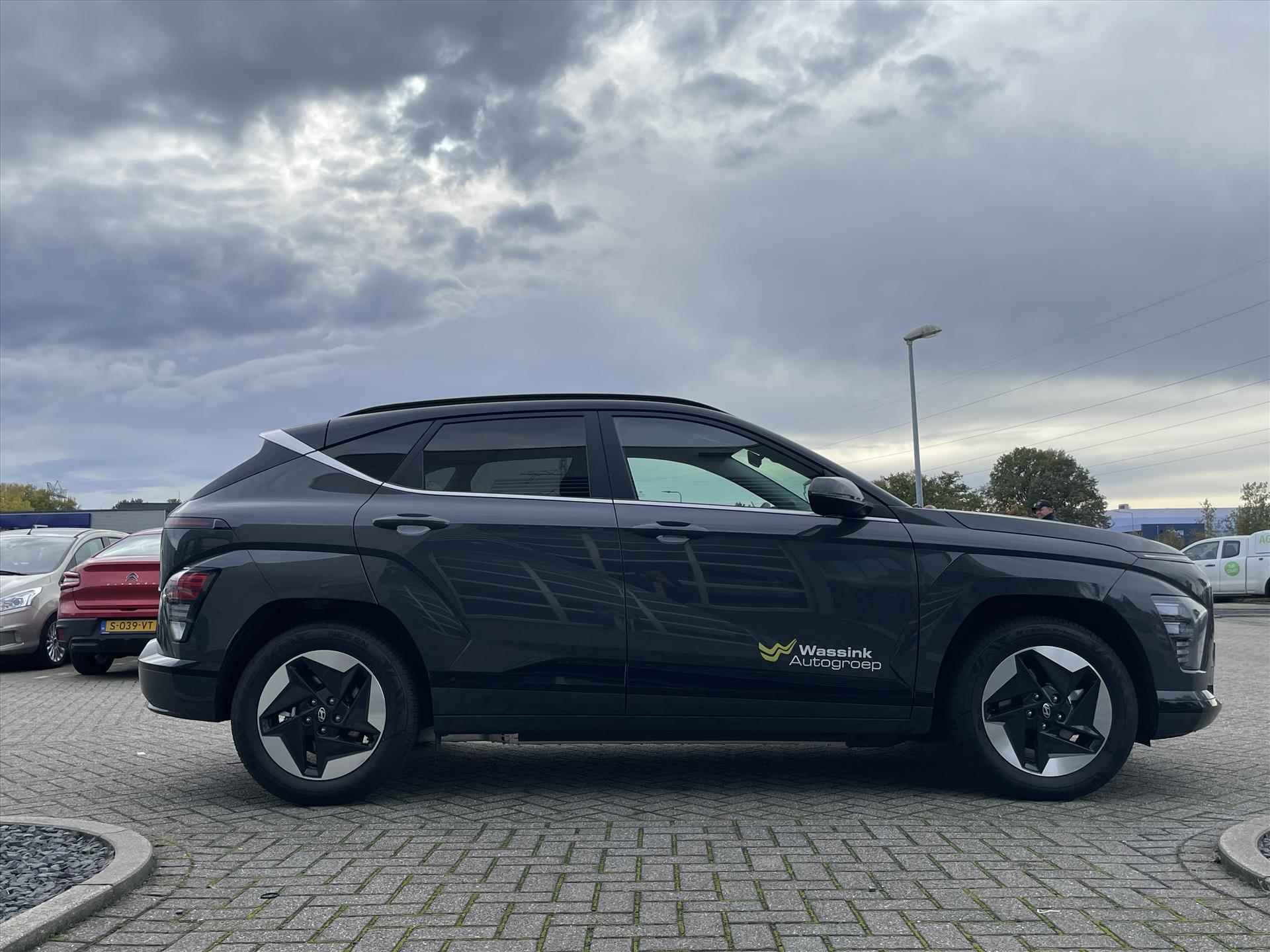 Hyundai Kona New 65,4 kWh 217pk Comfort Smart | Navigatie | Stoel en stuurverwarming | DAB+ | Apple Carplay & Android Auto | - 7/32