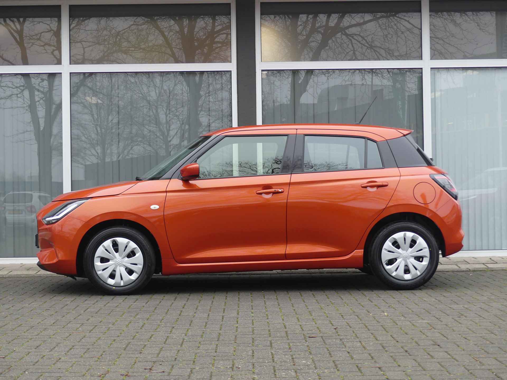 Suzuki Swift 1.2 Comfort Smart Hybrid 6-Jaar Fabrieksgarantie! Navigatie, Cruise Control, Park. sensoren - 4/31