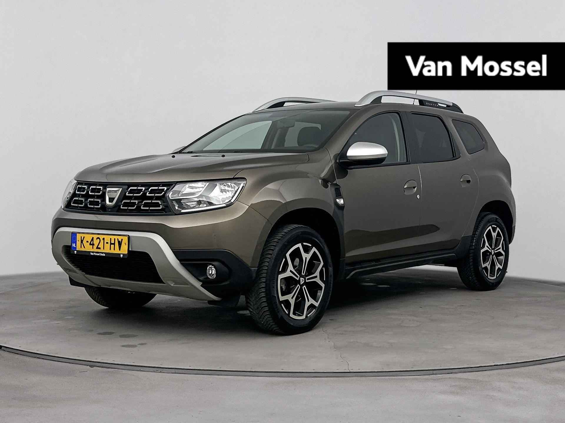 Dacia Duster 1.3 TCe 150Pk Prestige | Navigatie | Climate Control | Cruise Control | Stoelverwarming | Trekhaak | Apple Carplay/Android Auto | Parkeersensoren incl. 360 Camera | Lichtmetalen Velgen | Lederen Bekleding | Blind Spot Warning |