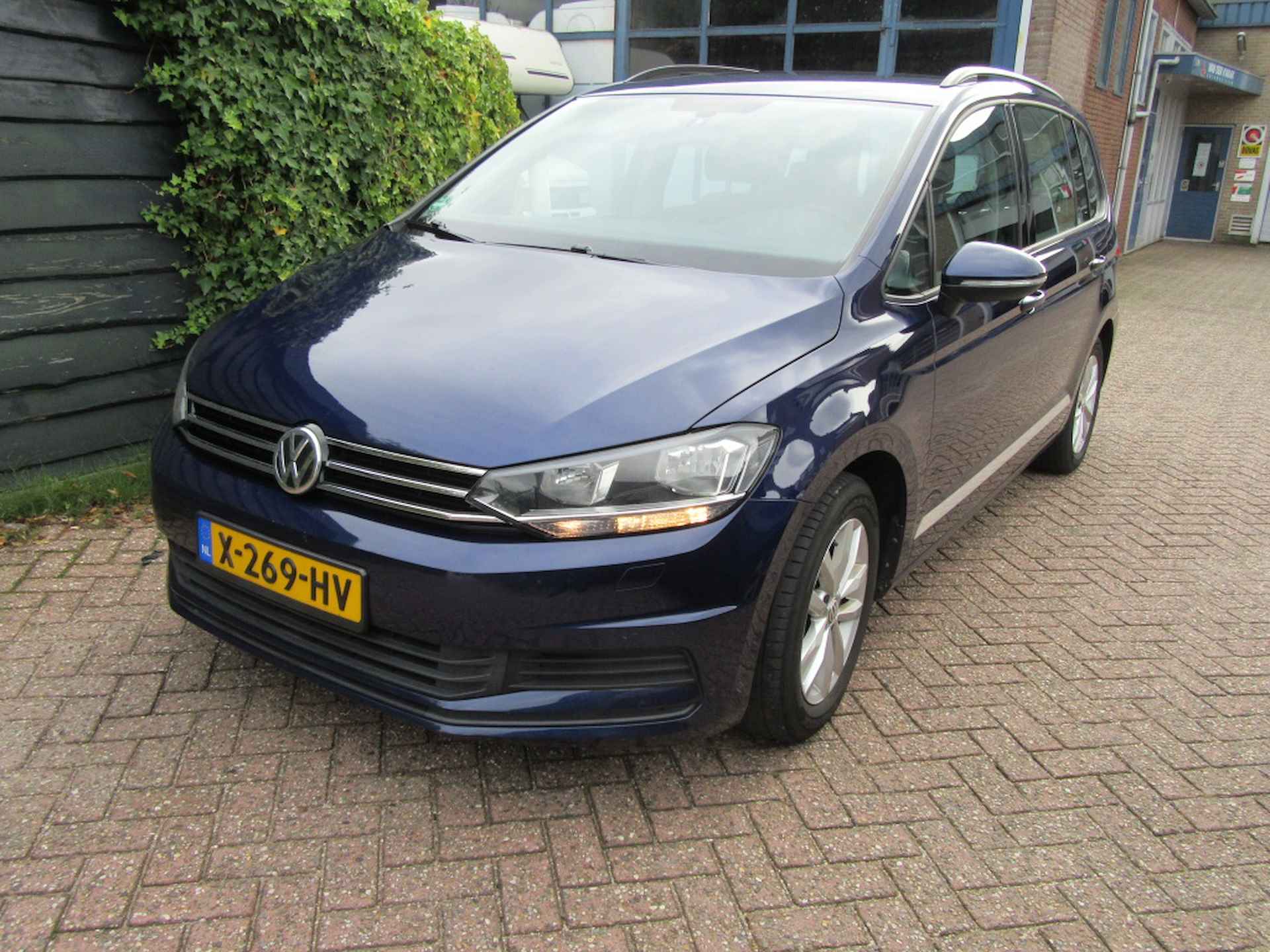 Volkswagen Touran 1.2 TSI Trendline Navigatie | Trekhaak | Clima - 29/31